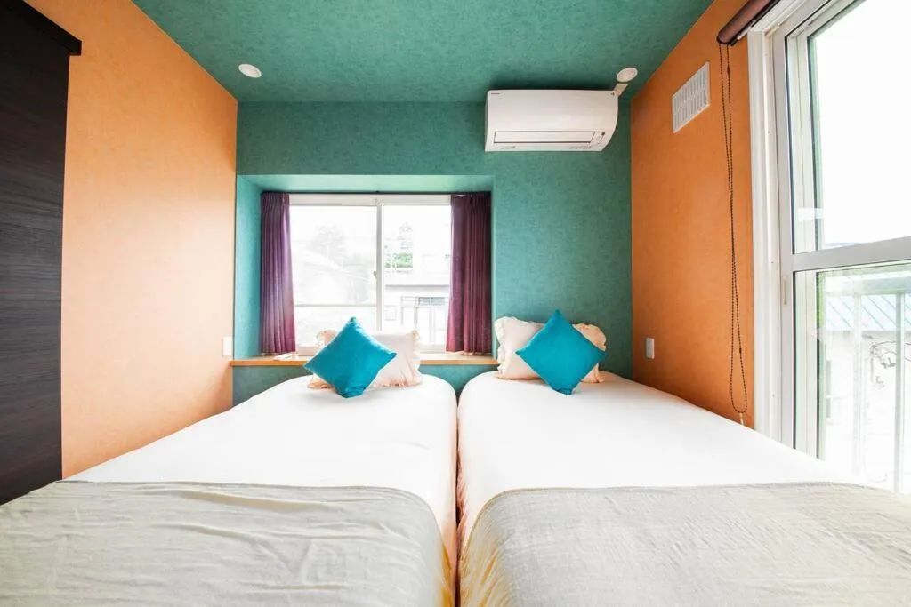 Bed in THE BEEHIVE AIOI