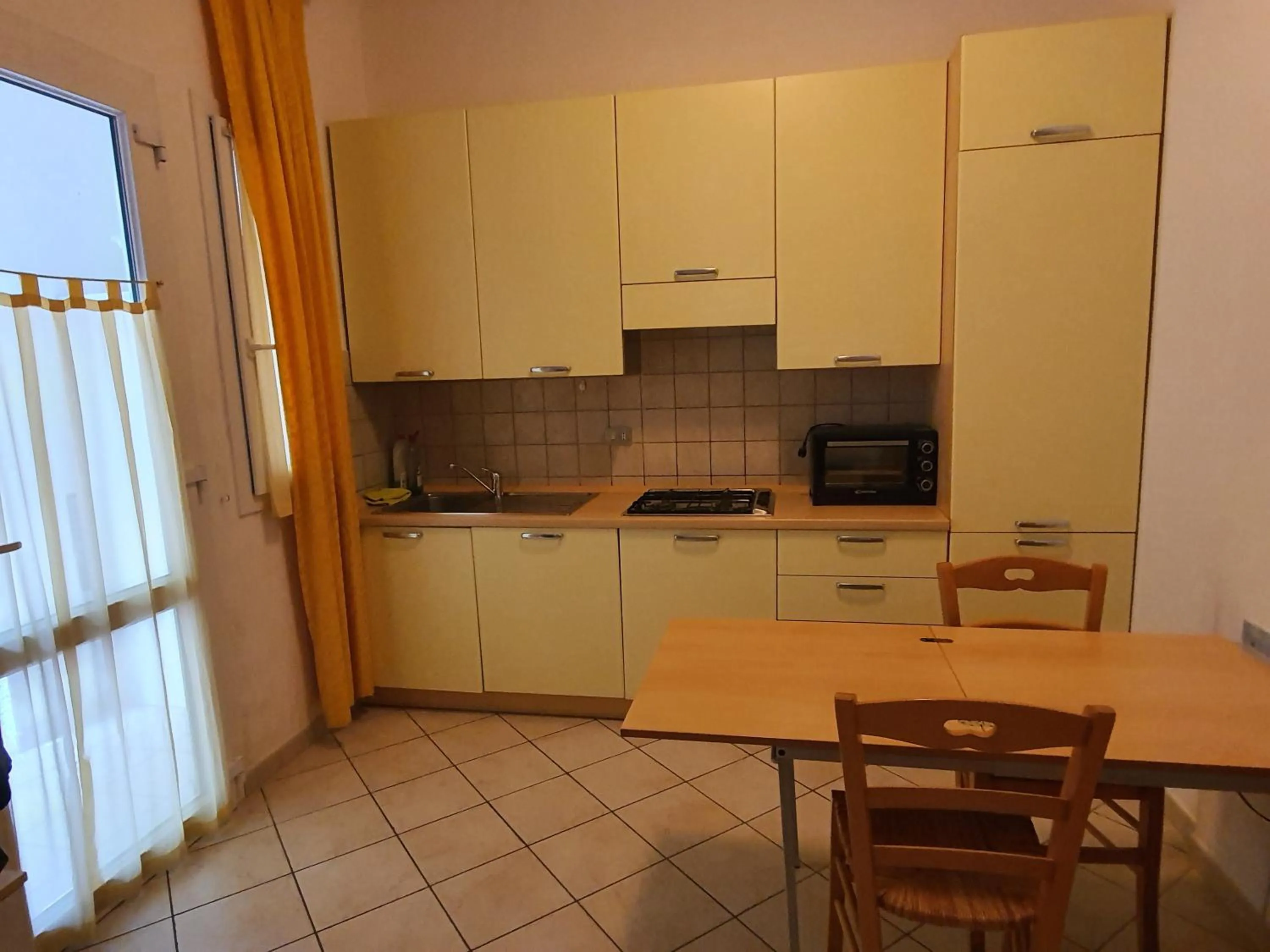 Kitchen or kitchenette in B&B Airone Cervia - Camere e Appartamenti