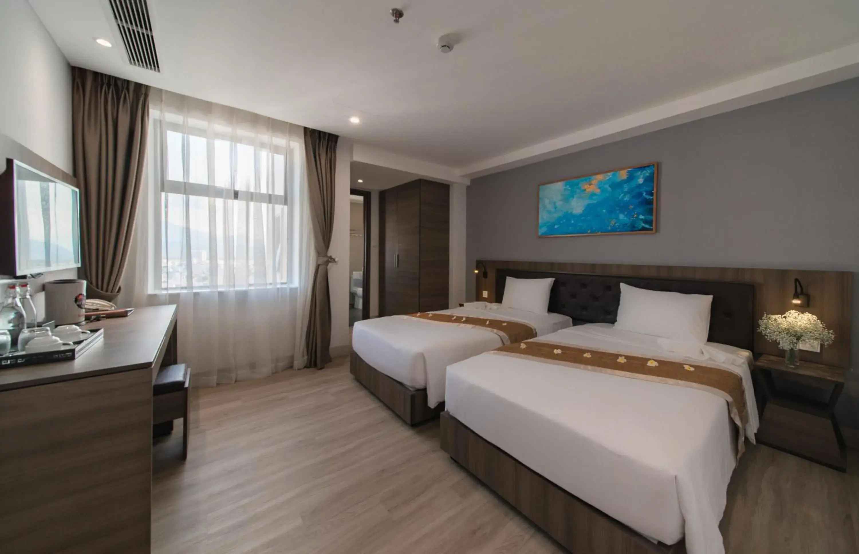 Deluxe Twin with City View in Zenia Boutique Hotel Nha Trang Deluxe Twin with City View in Zenia Boutique Hotel Nha Trang
