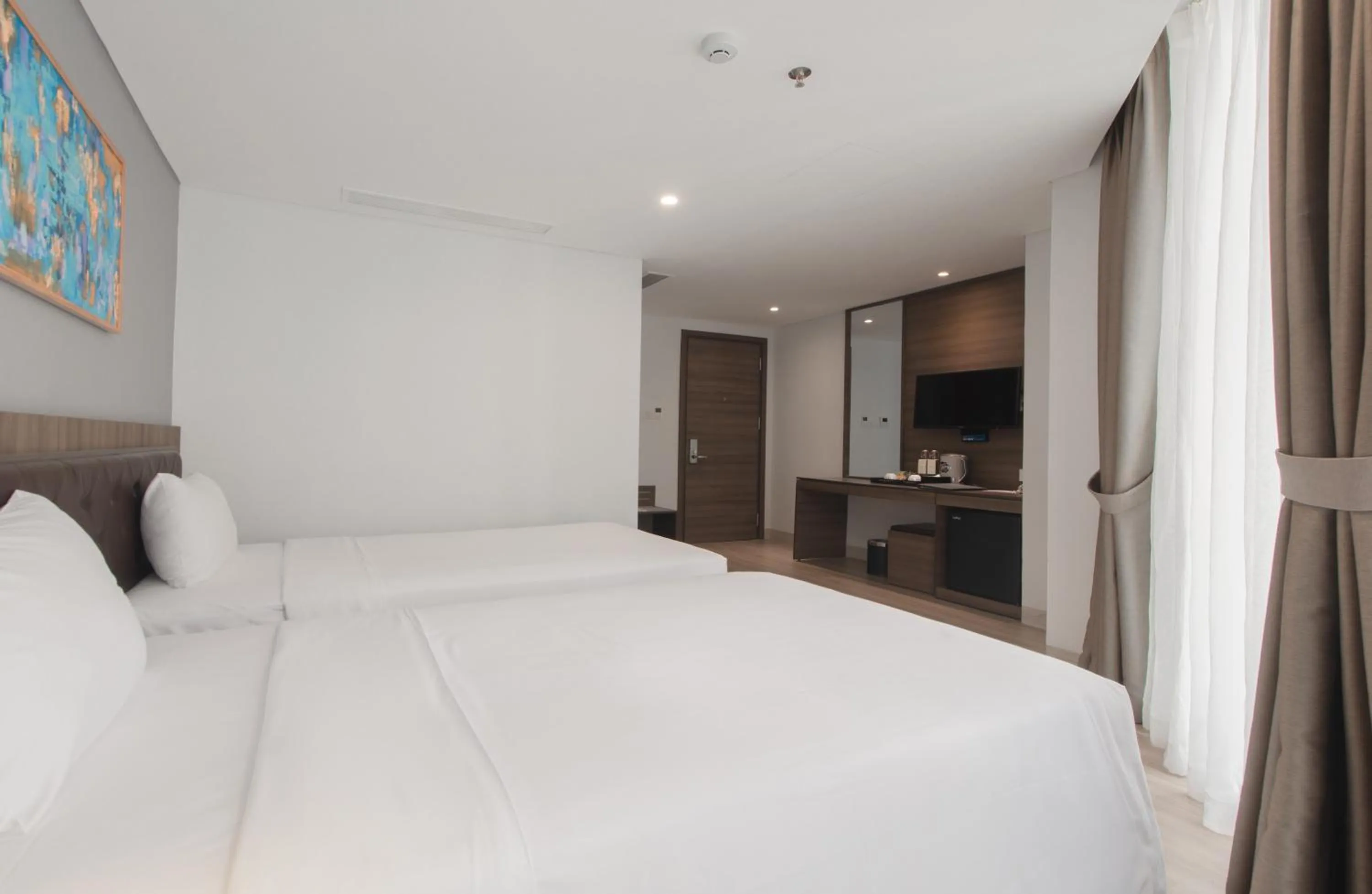 Photo of the whole room, Bed in Zenia Boutique Hotel Nha Trang
