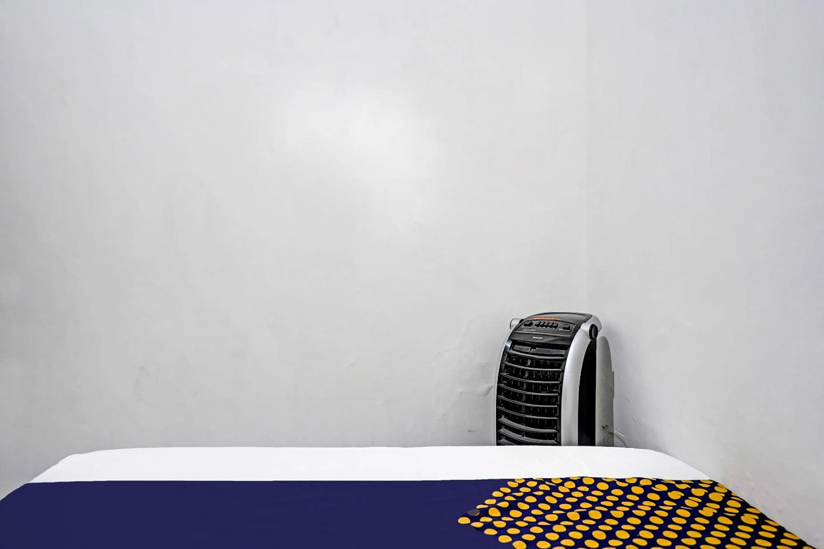 Bedroom in Hotel O Reva Residence Syariah