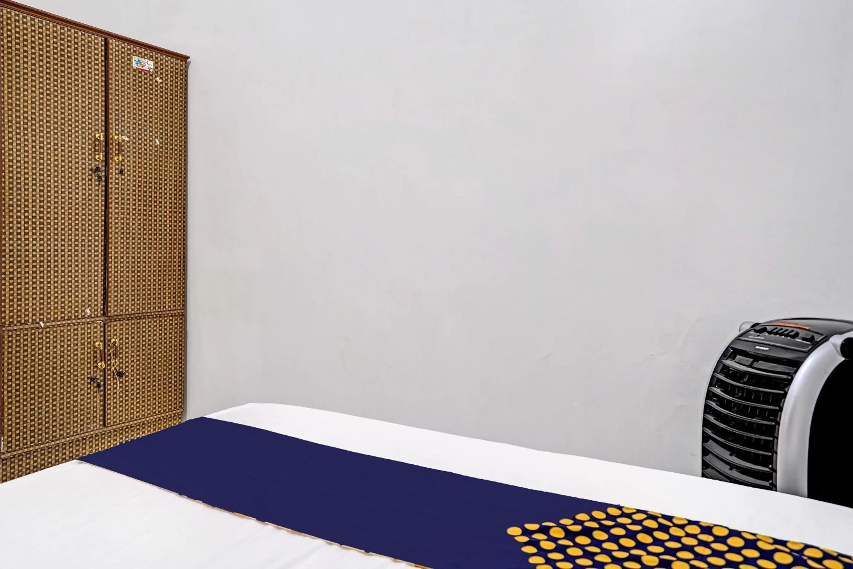 Bedroom in Hotel O Reva Residence Syariah