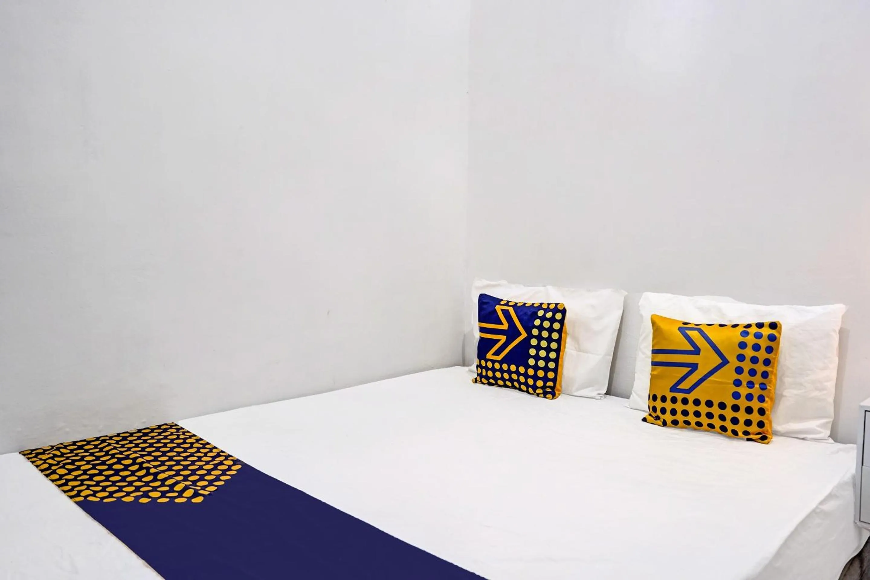 Bedroom in Hotel O Reva Residence Syariah