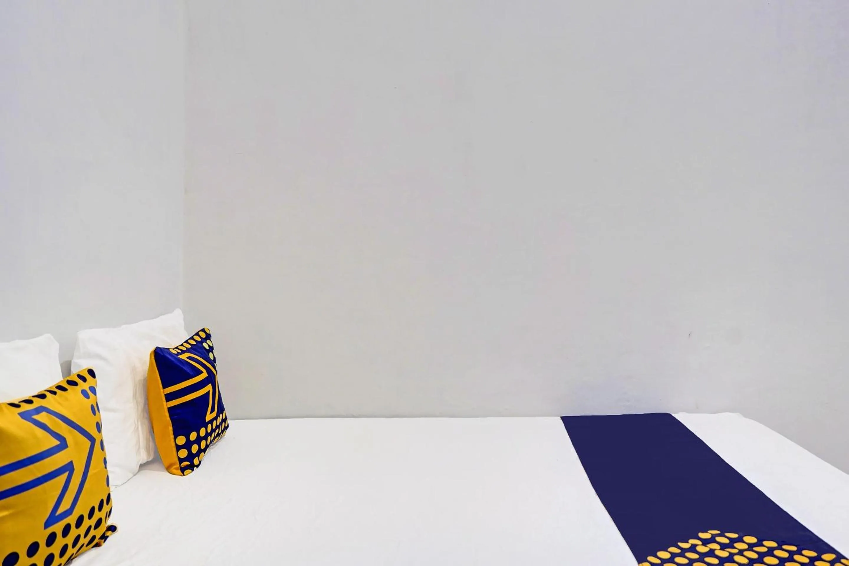 Bedroom in Hotel O Reva Residence Syariah