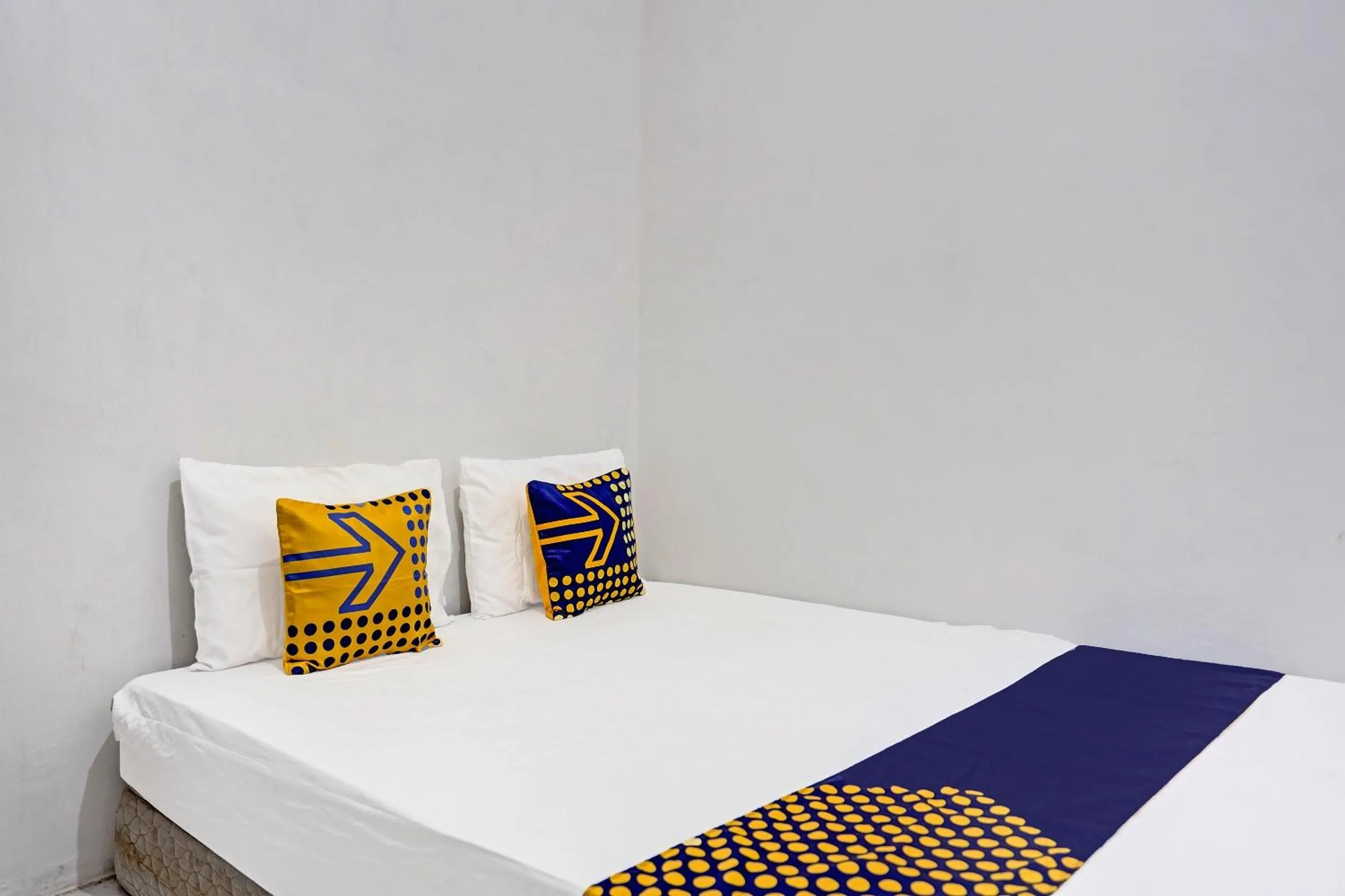 Bedroom in Hotel O Reva Residence Syariah