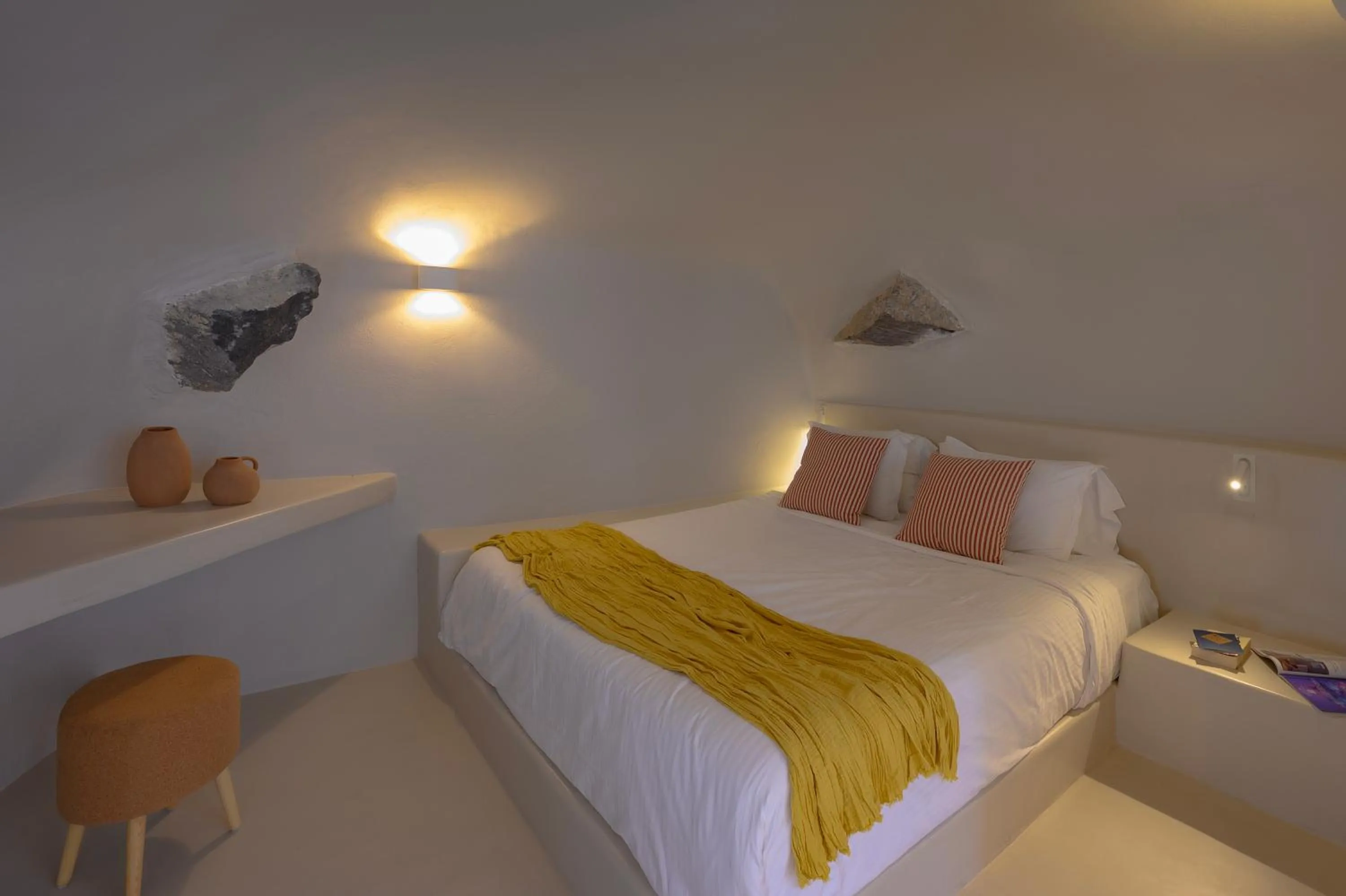 Bed in Elements Cave Suites