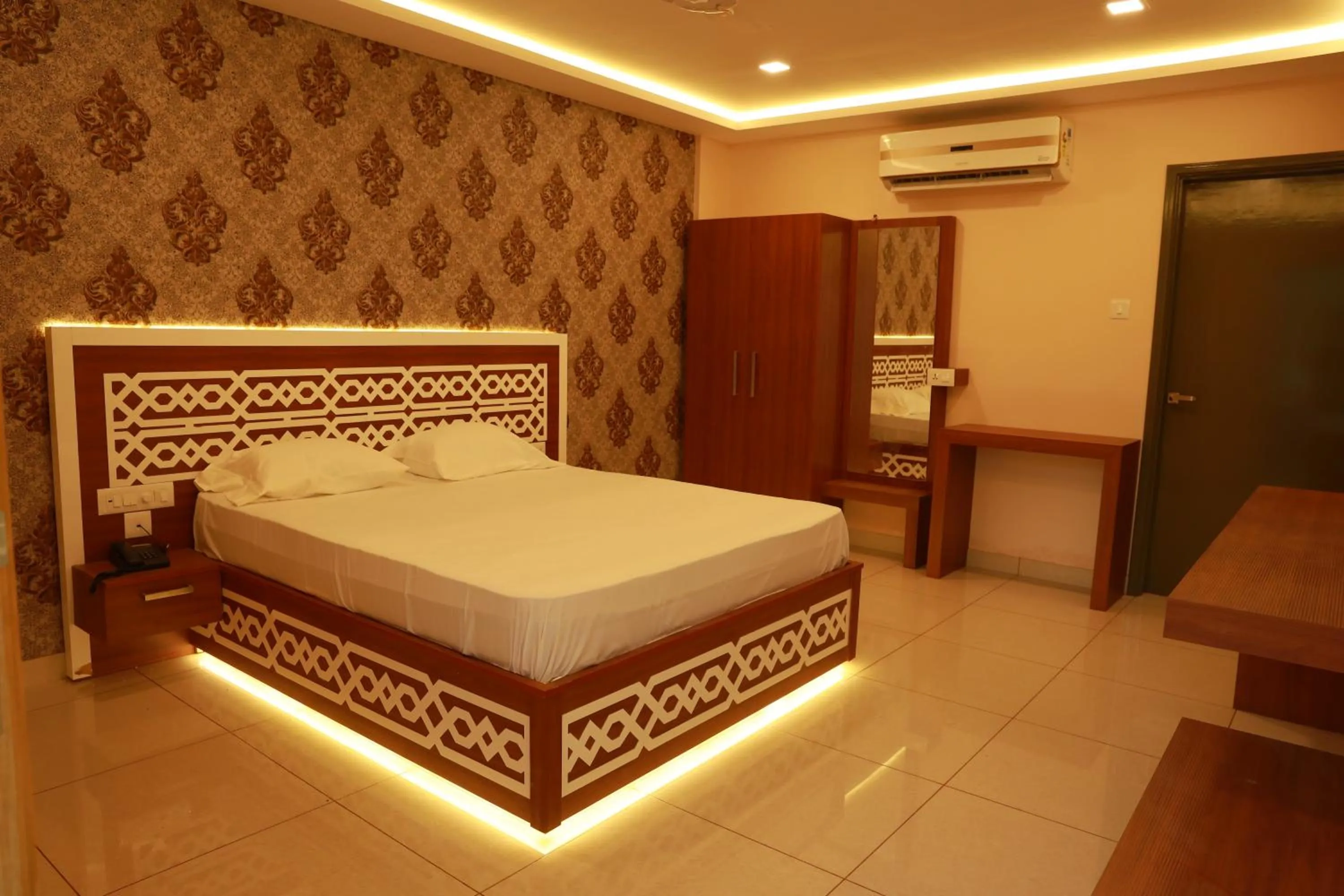 Photo of the whole room, Bed in Emerald Royal Residency