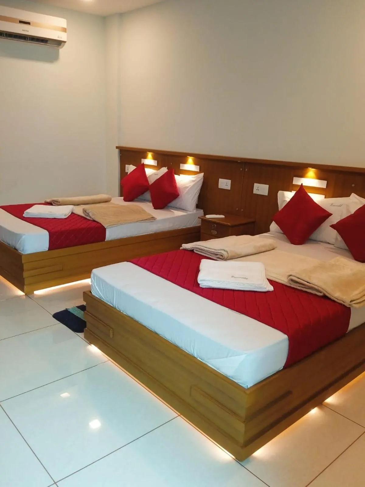 Photo of the whole room, Bed in Emerald Royal Residency