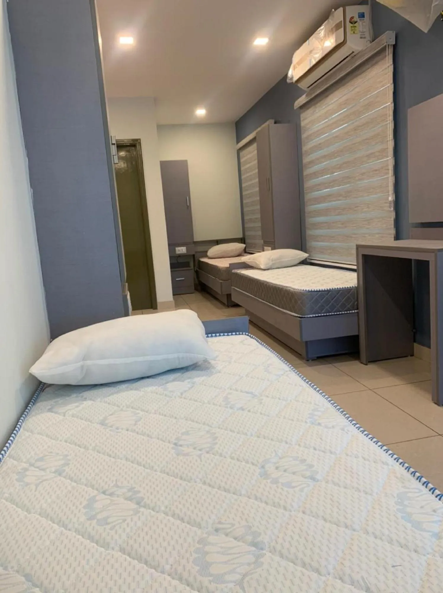 Bed in Emerald Royal Residency