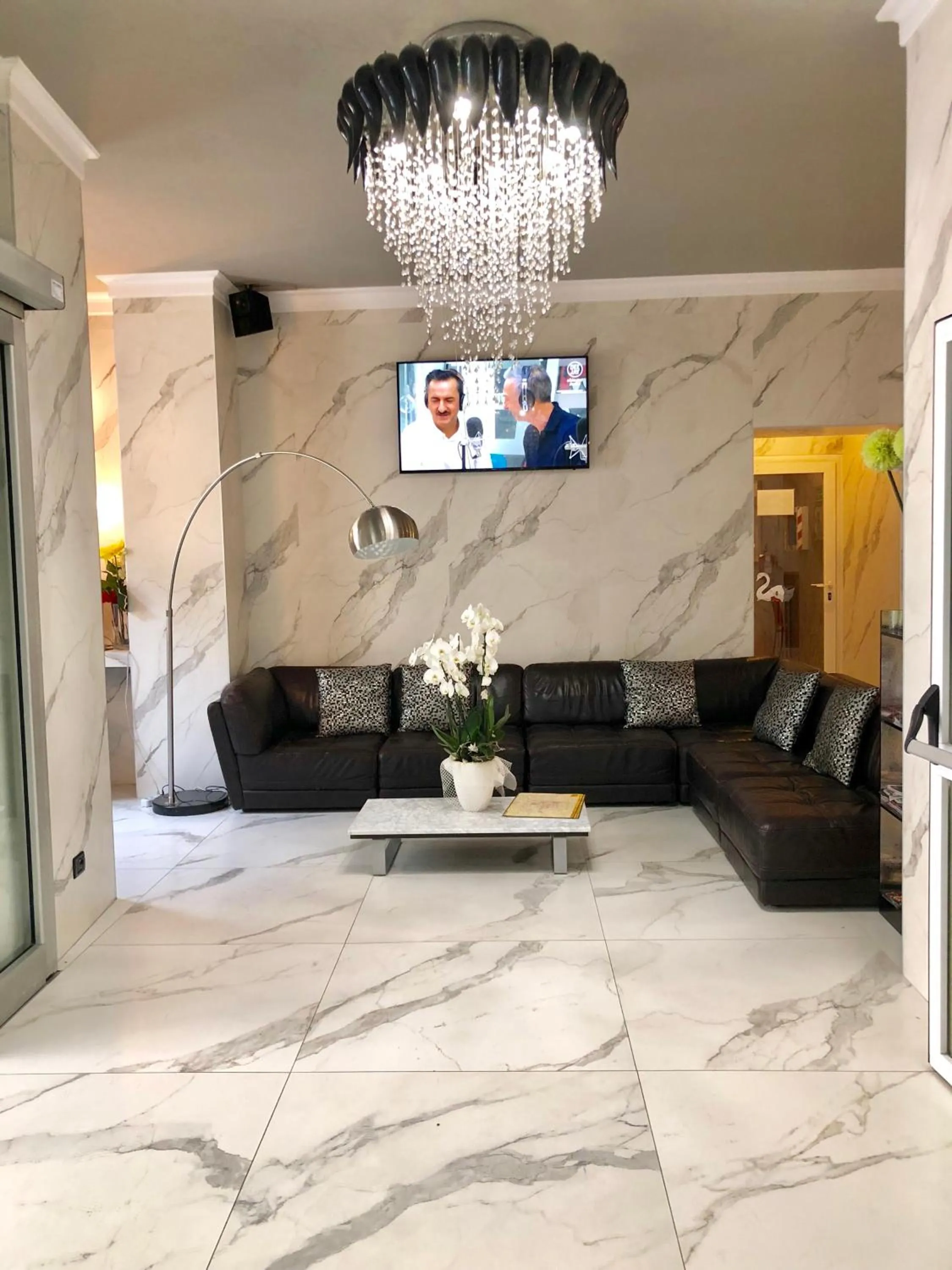 Communal lounge/ TV room in Hotel Bolzano