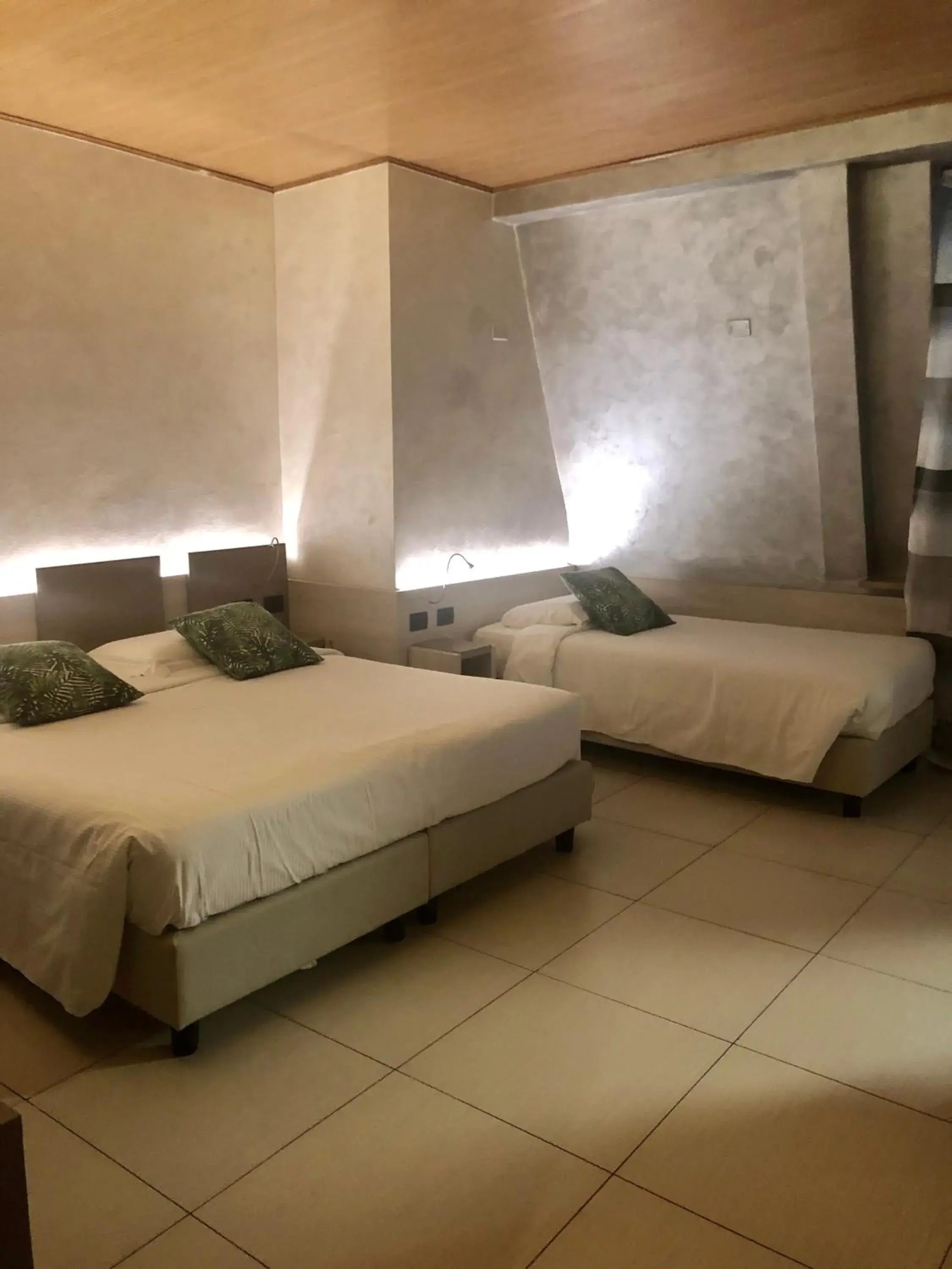 Triple Room in Hotel Bolzano Triple Room in Hotel Bolzano