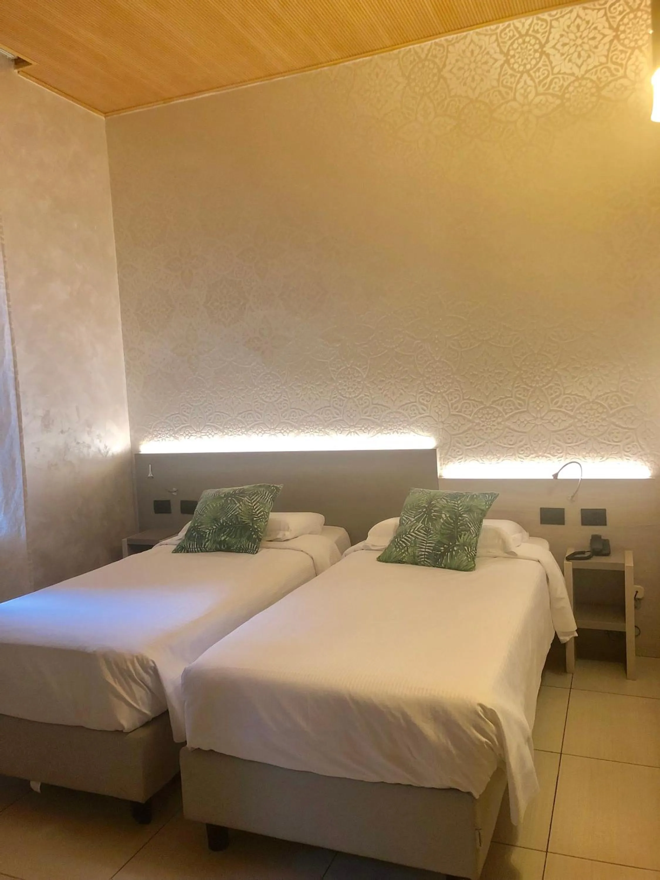 Bedroom, Bed in Hotel Bolzano