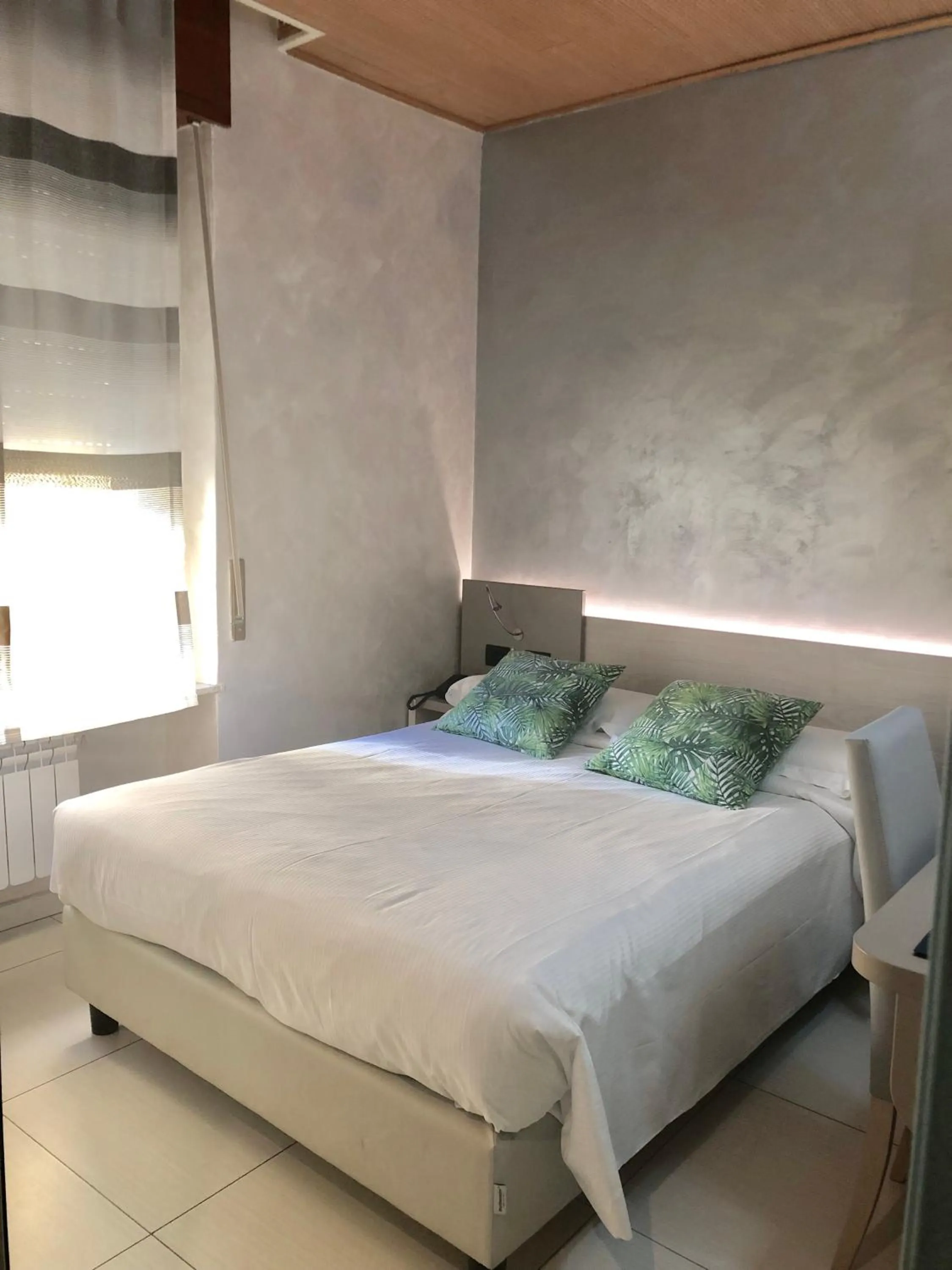 Bedroom, Bed in Hotel Bolzano