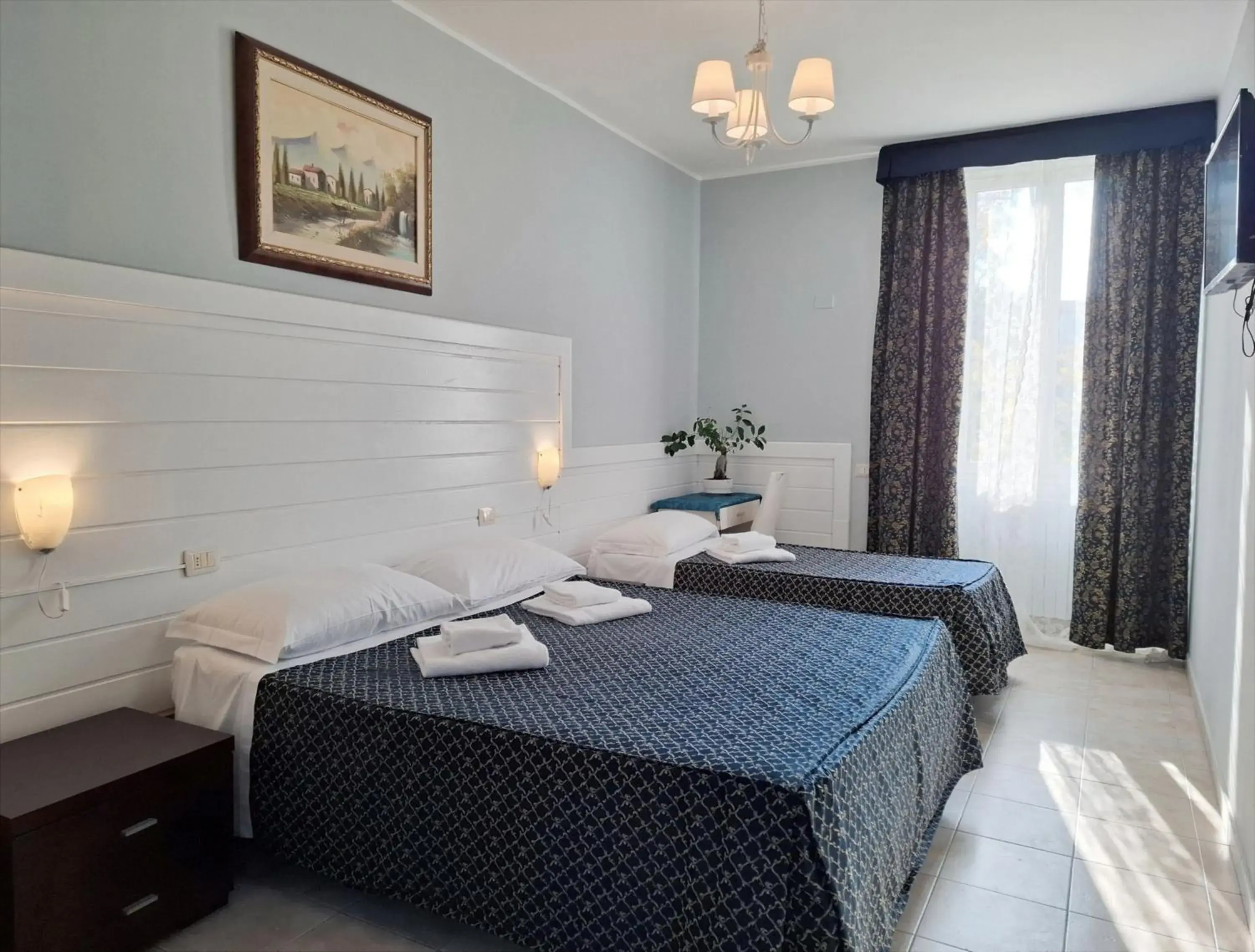 Triple Room in Hotel Aurelia Milano Centrale Triple Room in Hotel Aurelia Milano Centrale