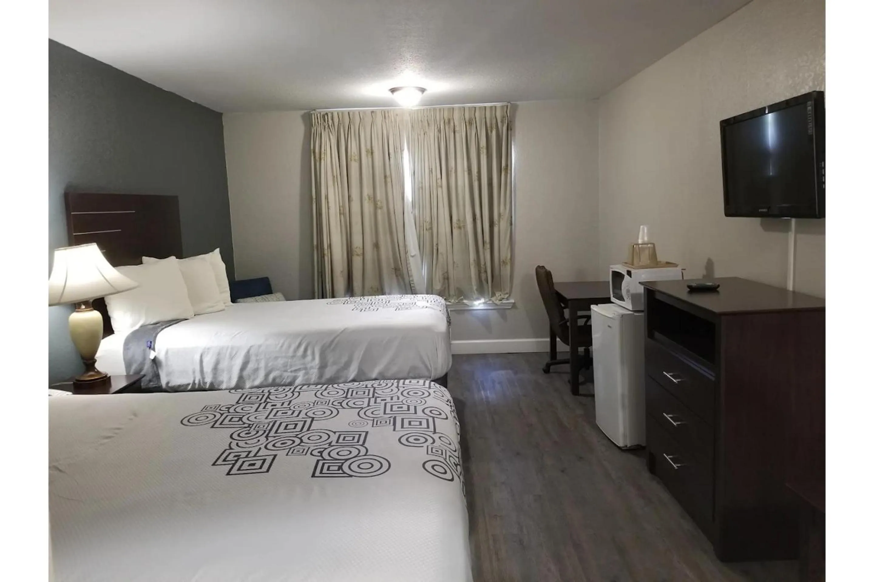 Bedroom, Bed in Regency Inn & Suites Houston East I 10