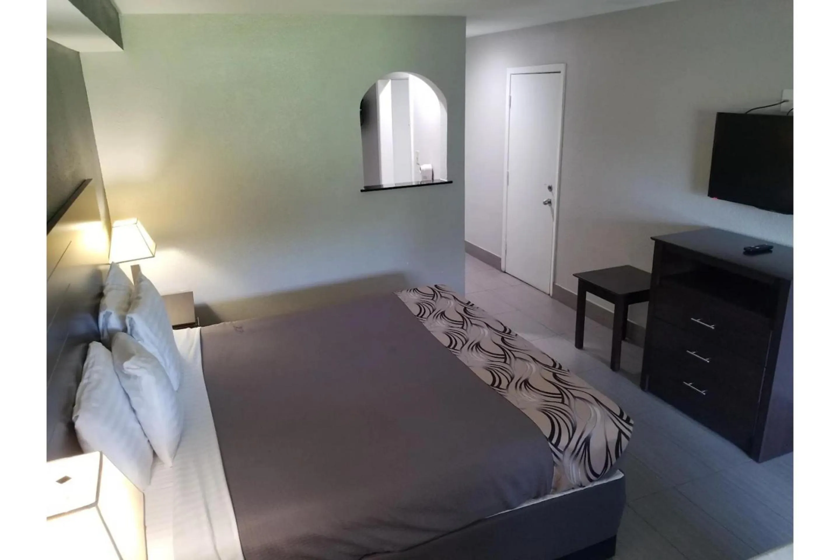 Bedroom, Bed in Regency Inn & Suites Houston East I 10