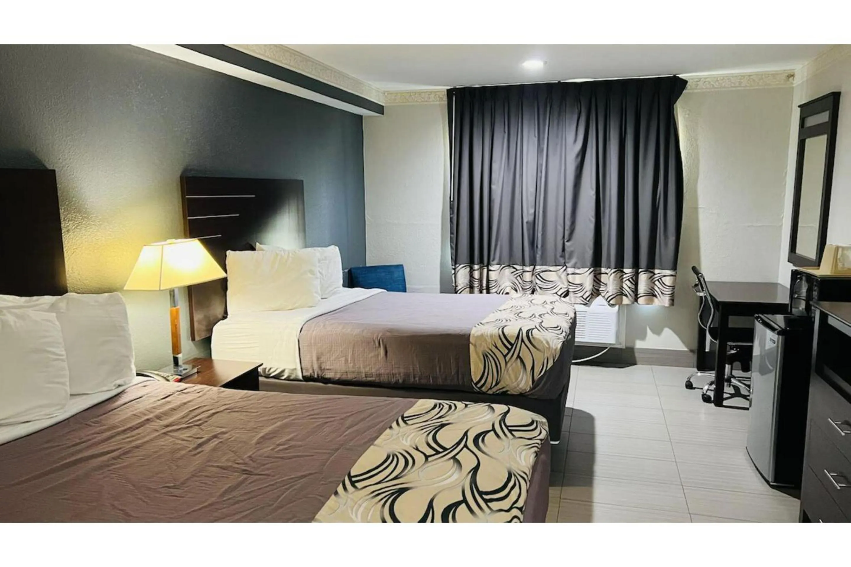 Bedroom, Bed in Regency Inn & Suites Houston East I 10