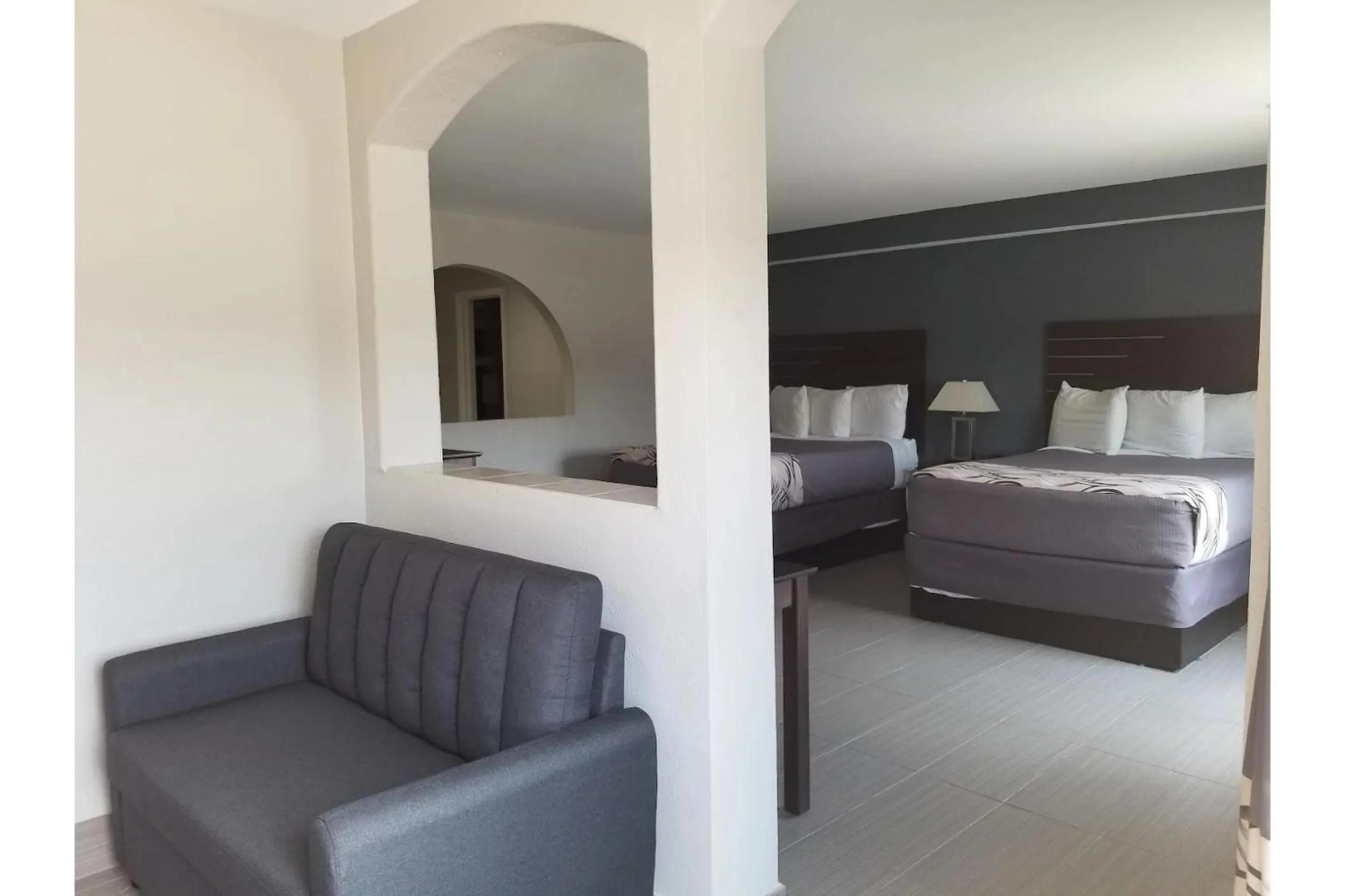 Bedroom, Bed in Regency Inn & Suites Houston East I 10