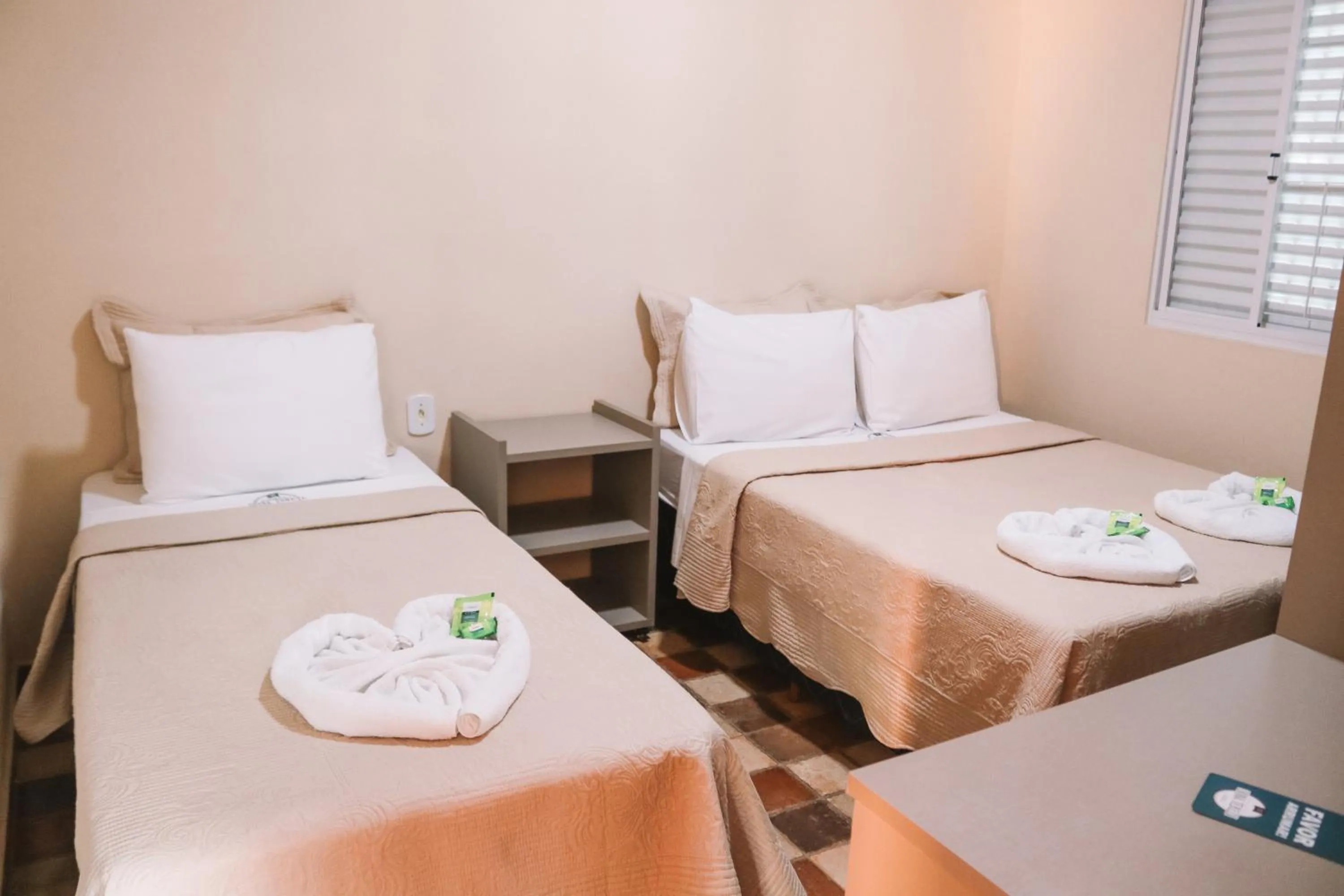 Bed in Pousada Dona Tereza