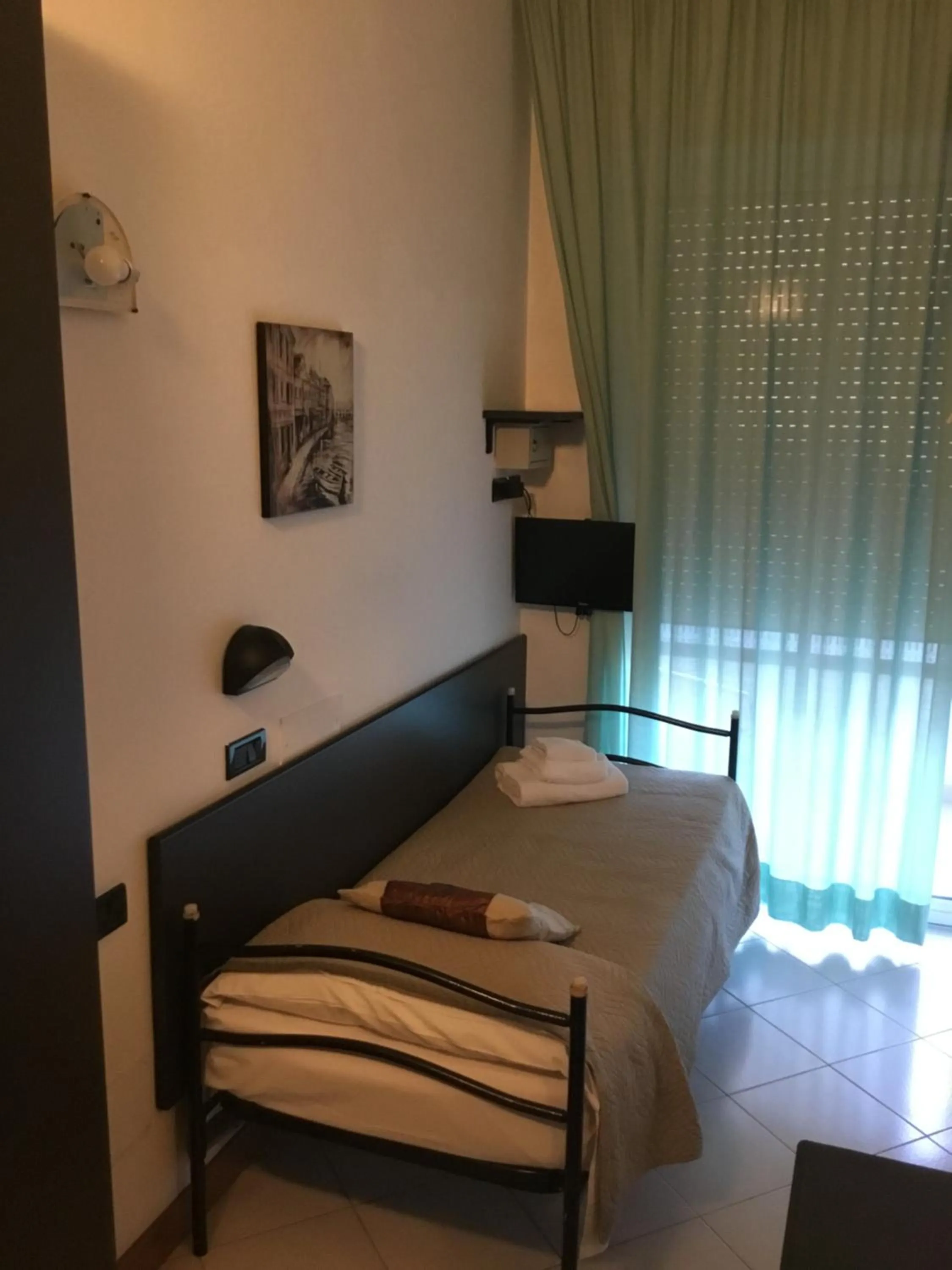 Bed in SI Rimini Hotel