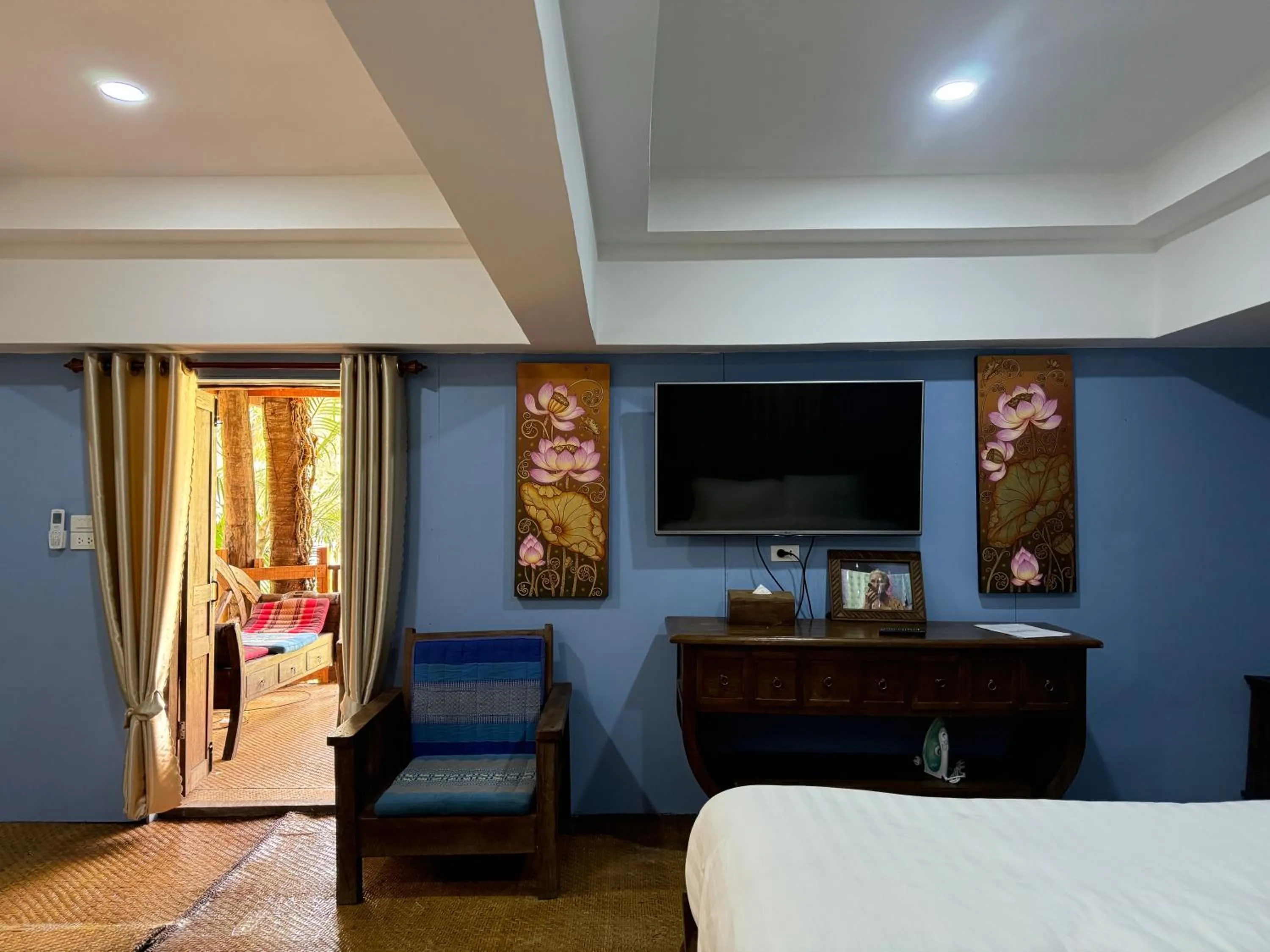 Seating area, Bed in On The Mekong Resort