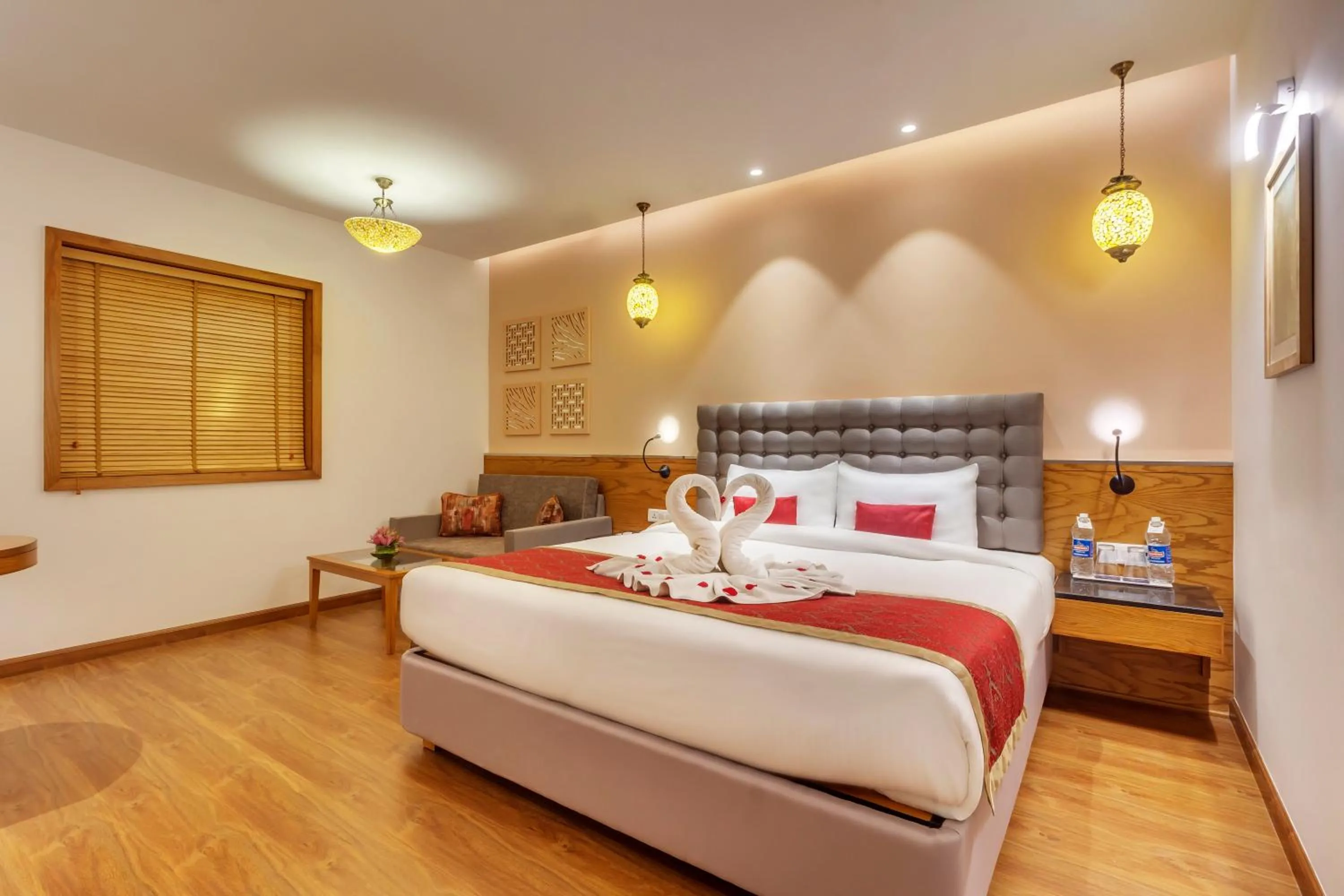 Photo of the whole room, Bed in Golden Tulip New Delhi - Hari Nagar