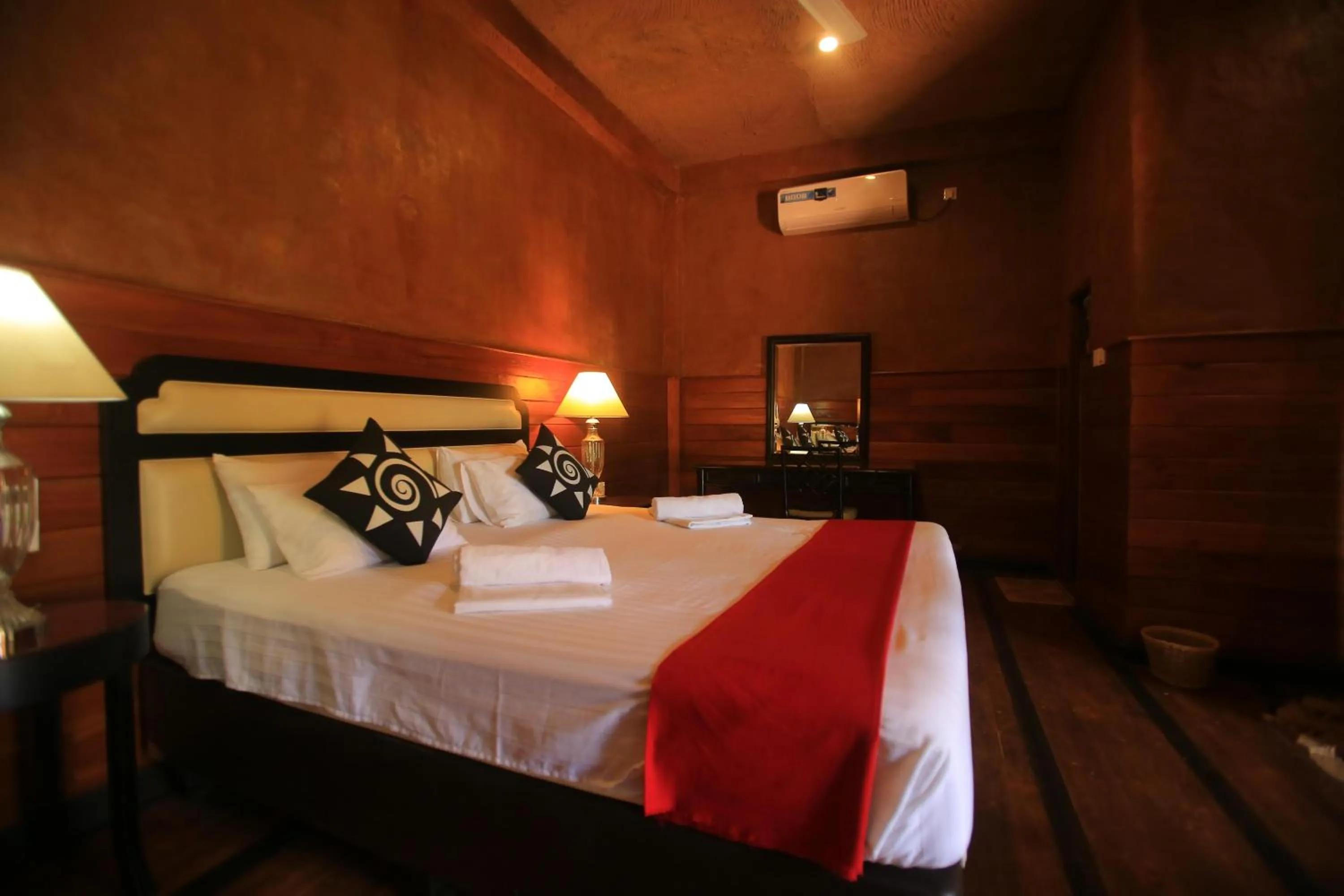 Bed in Jungle Hut Resort Sigiriya