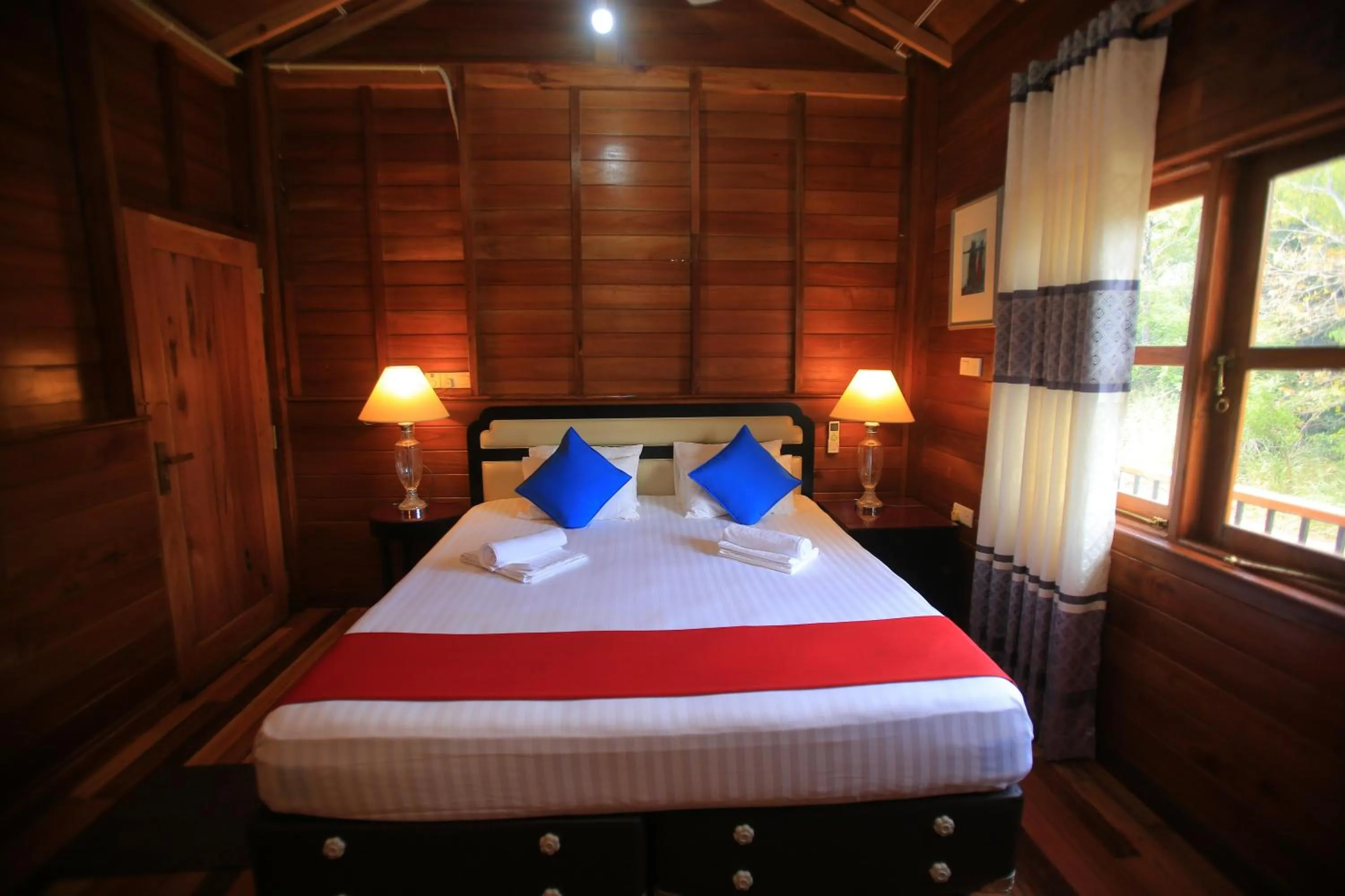 Photo of the whole room, Bed in Jungle Hut Resort Sigiriya