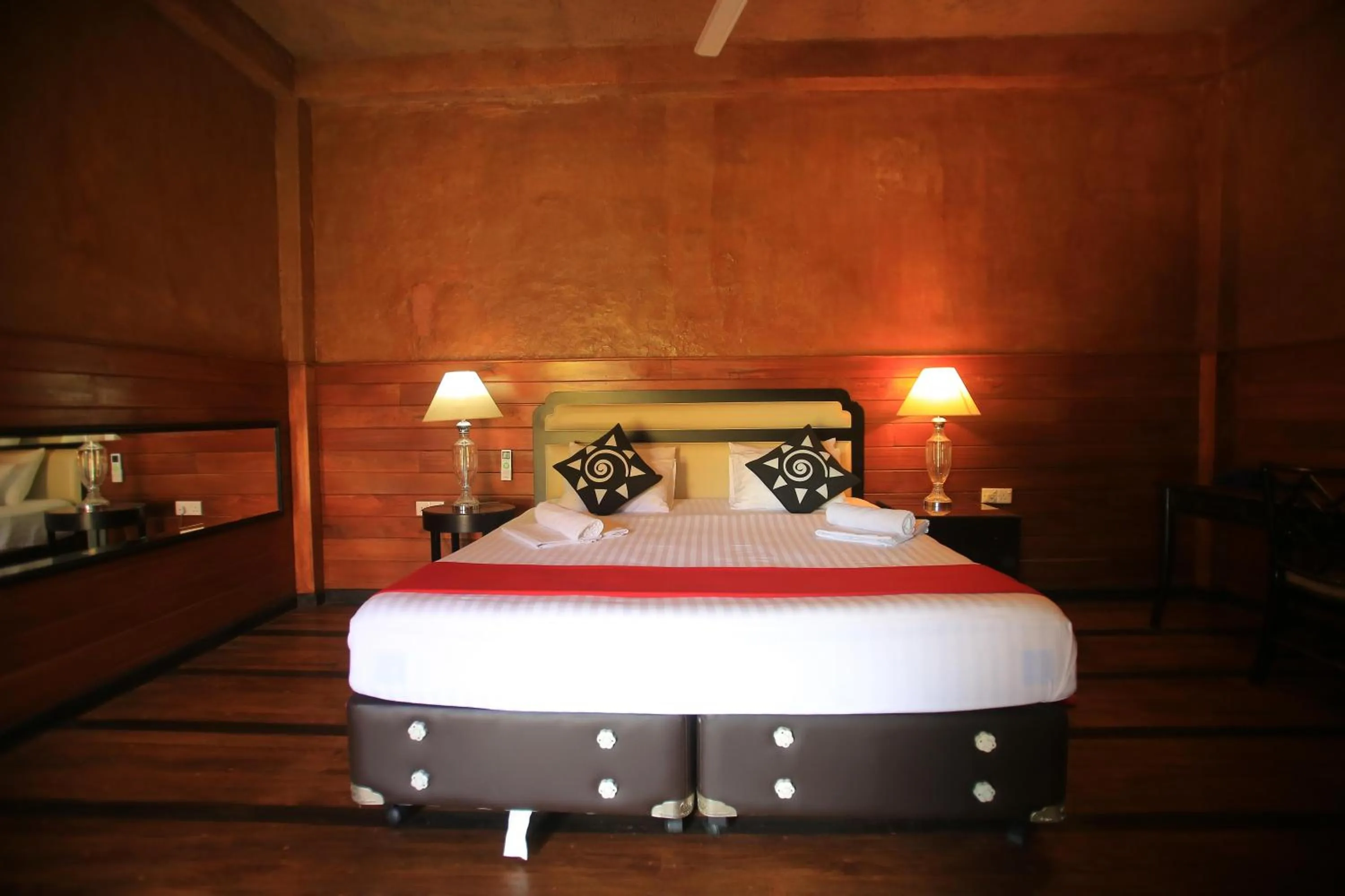 Bed in Jungle Hut Resort Sigiriya