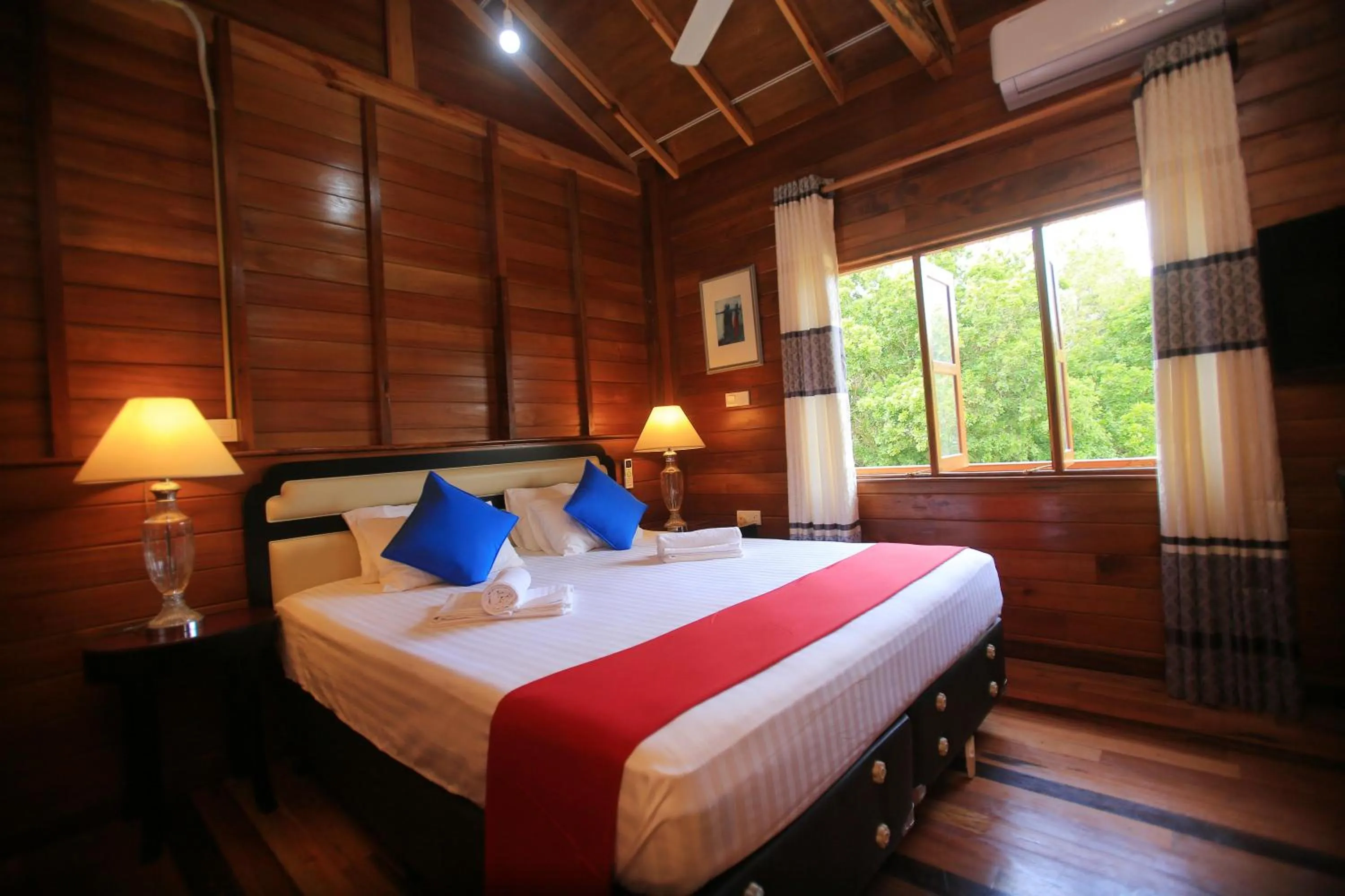 Bed in Jungle Hut Resort Sigiriya