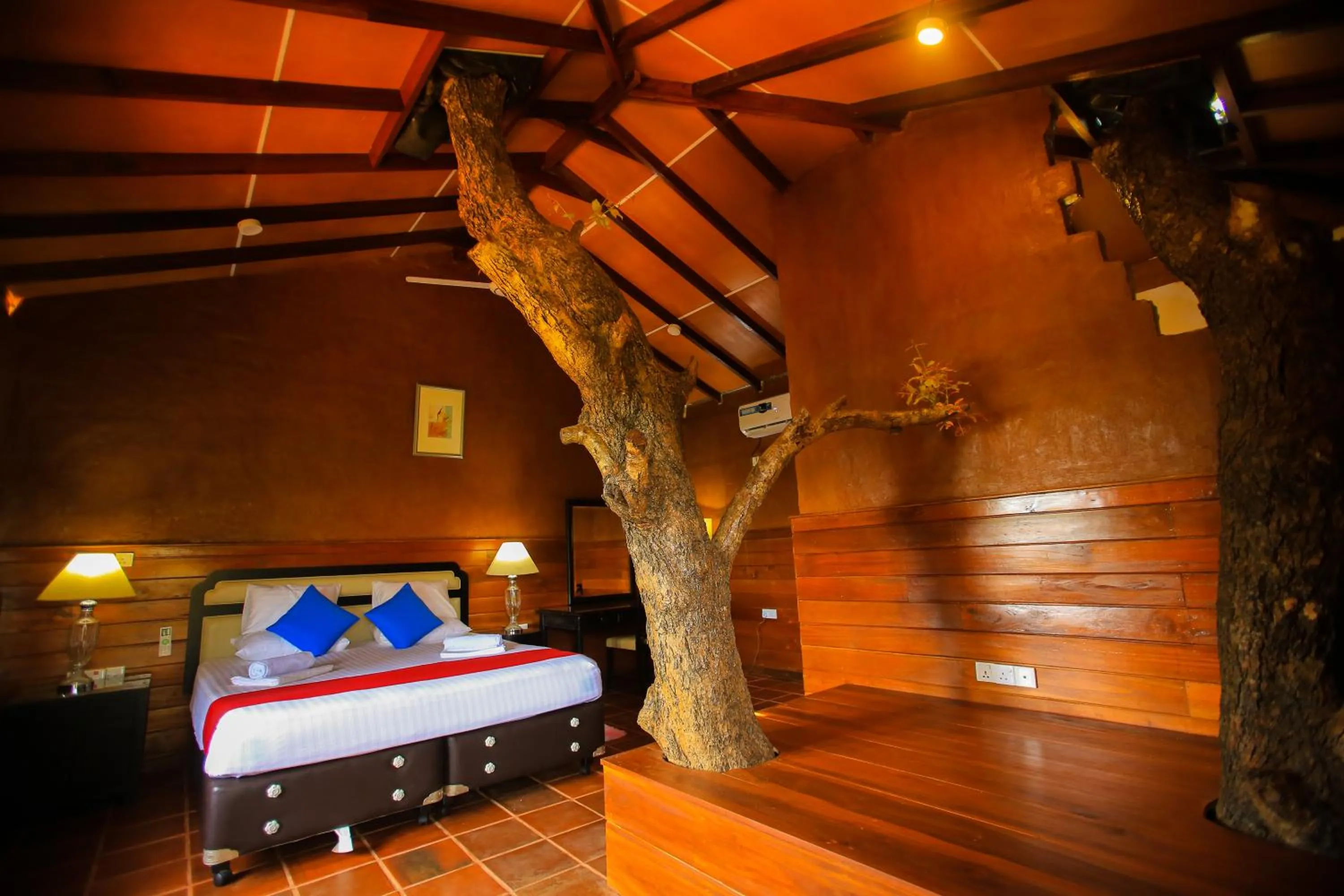 Bed in Jungle Hut Resort Sigiriya