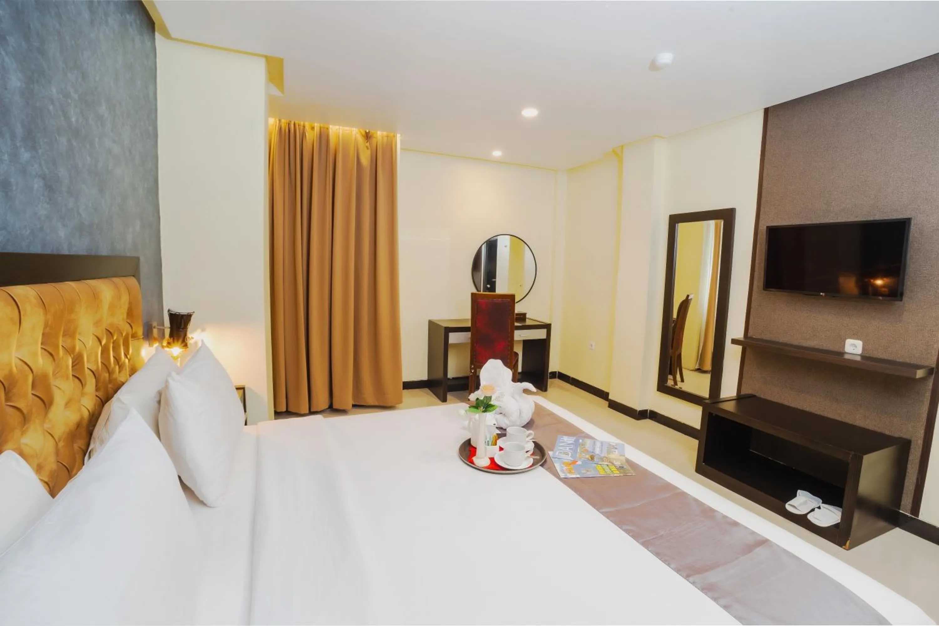 Photo of the whole room, Bed in Parkside Star Hotel Jayapura