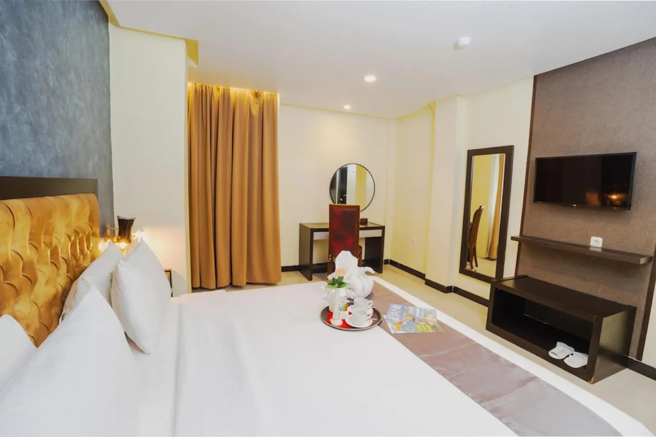 Photo of the whole room, Bed in Parkside Star Hotel Jayapura