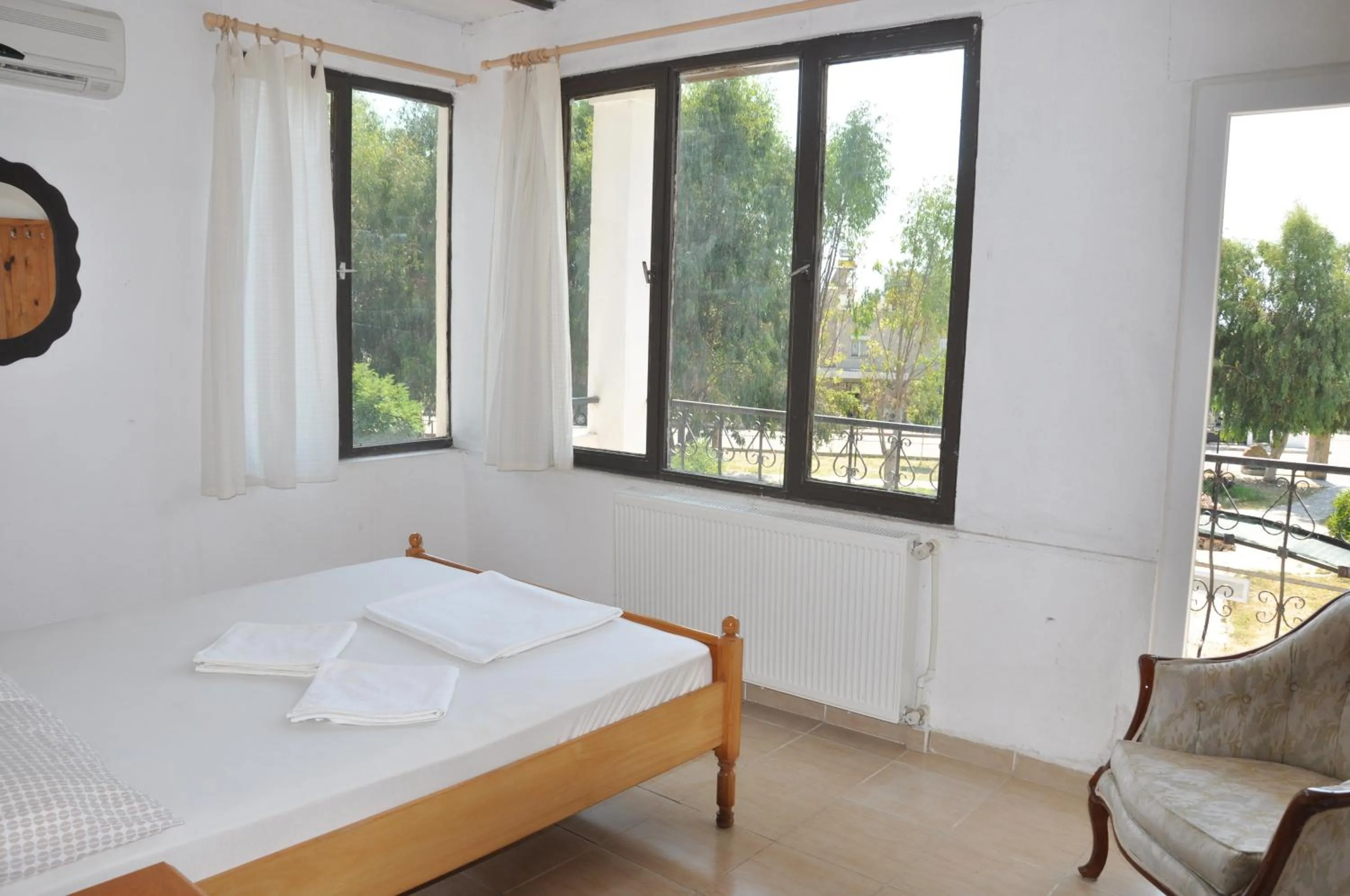 Bed in Mursel Garden Hotel