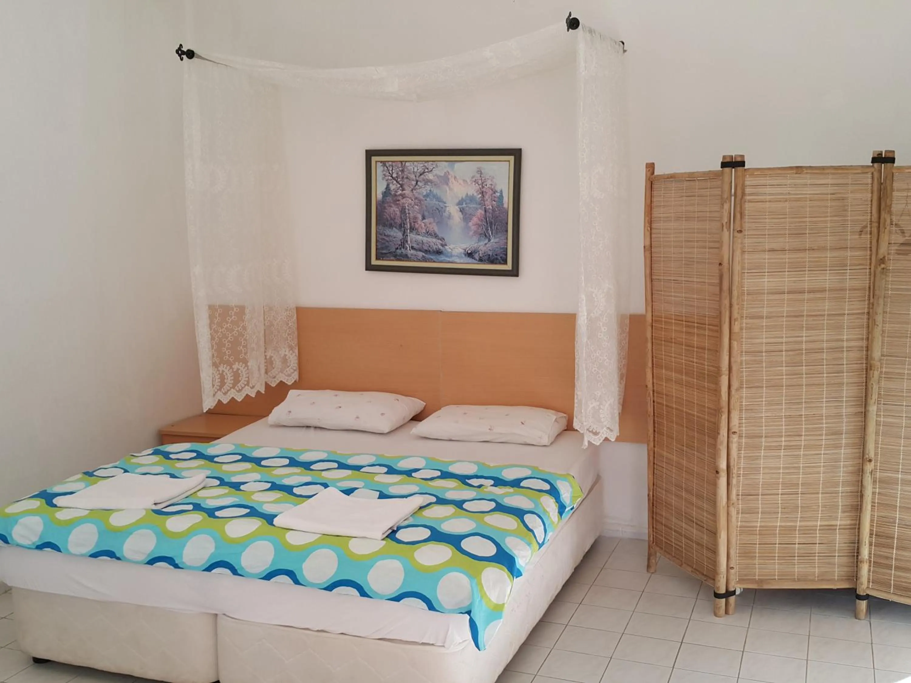 Bed in Mursel Garden Hotel