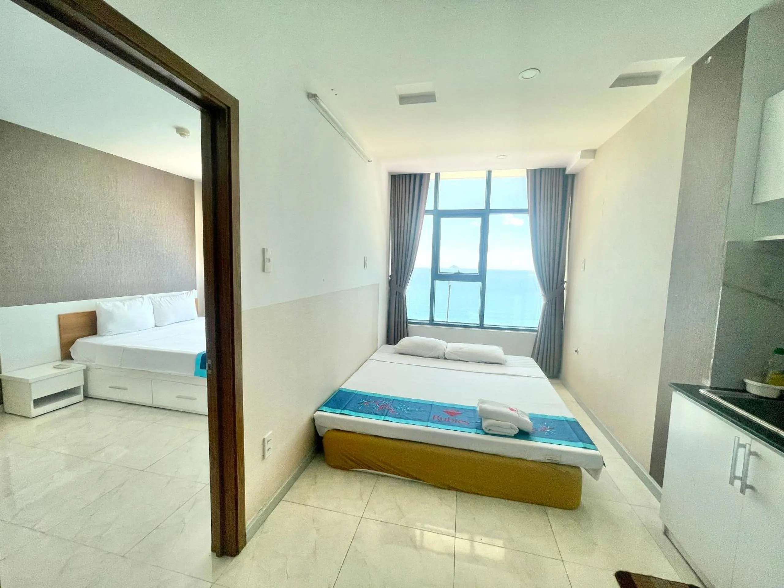 Bed in Pearl Nha Trang Beach Apartment