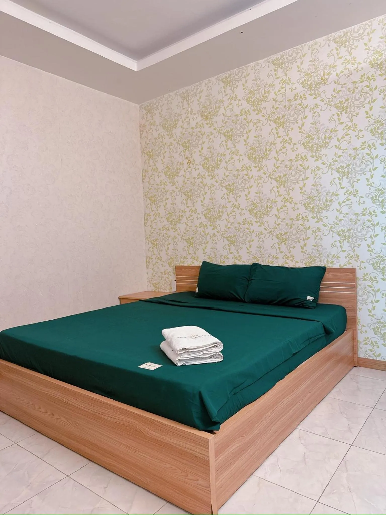 Bed in Pearl Nha Trang Beach Apartment