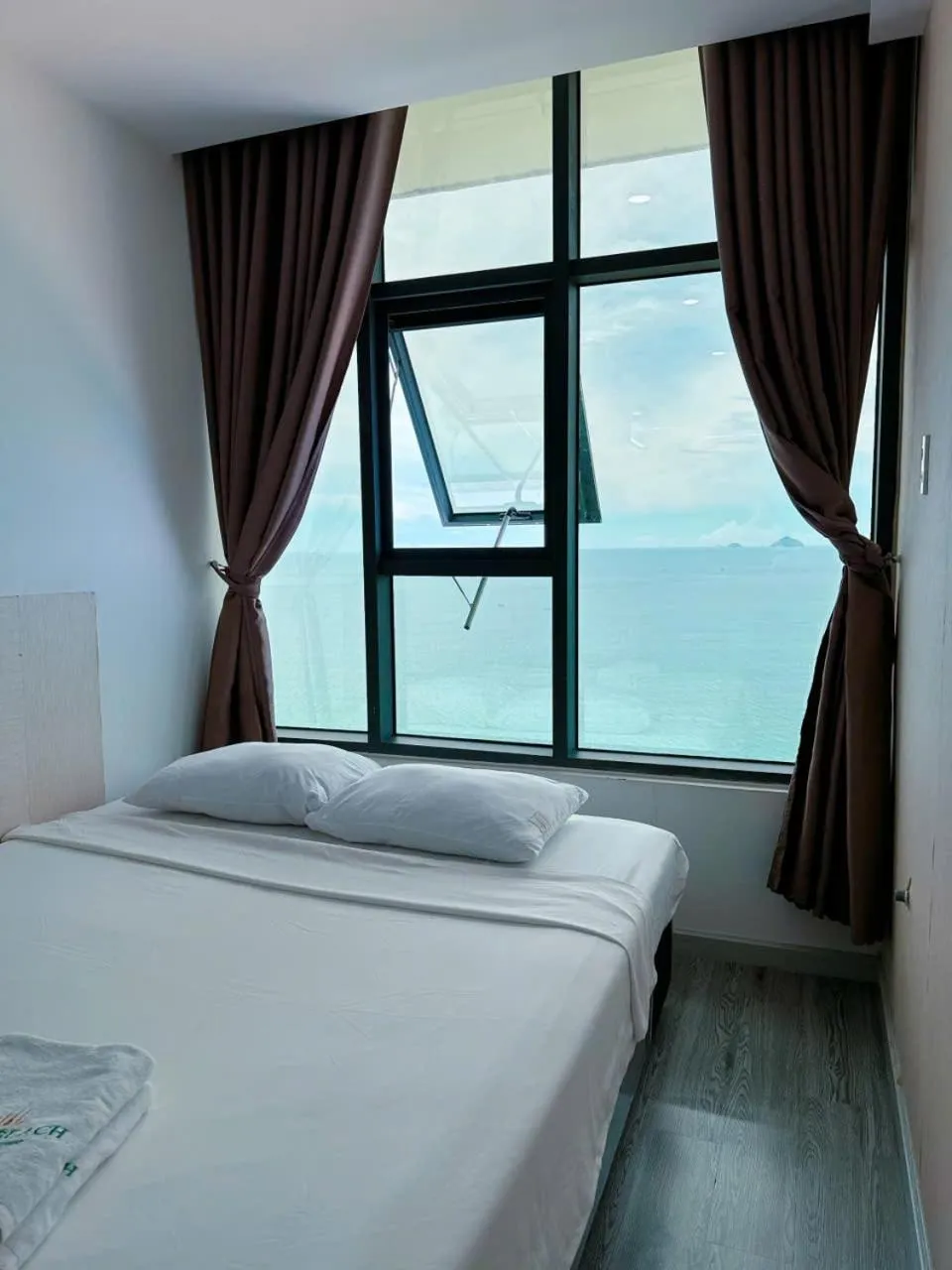 Bed in Pearl Nha Trang Beach Apartment