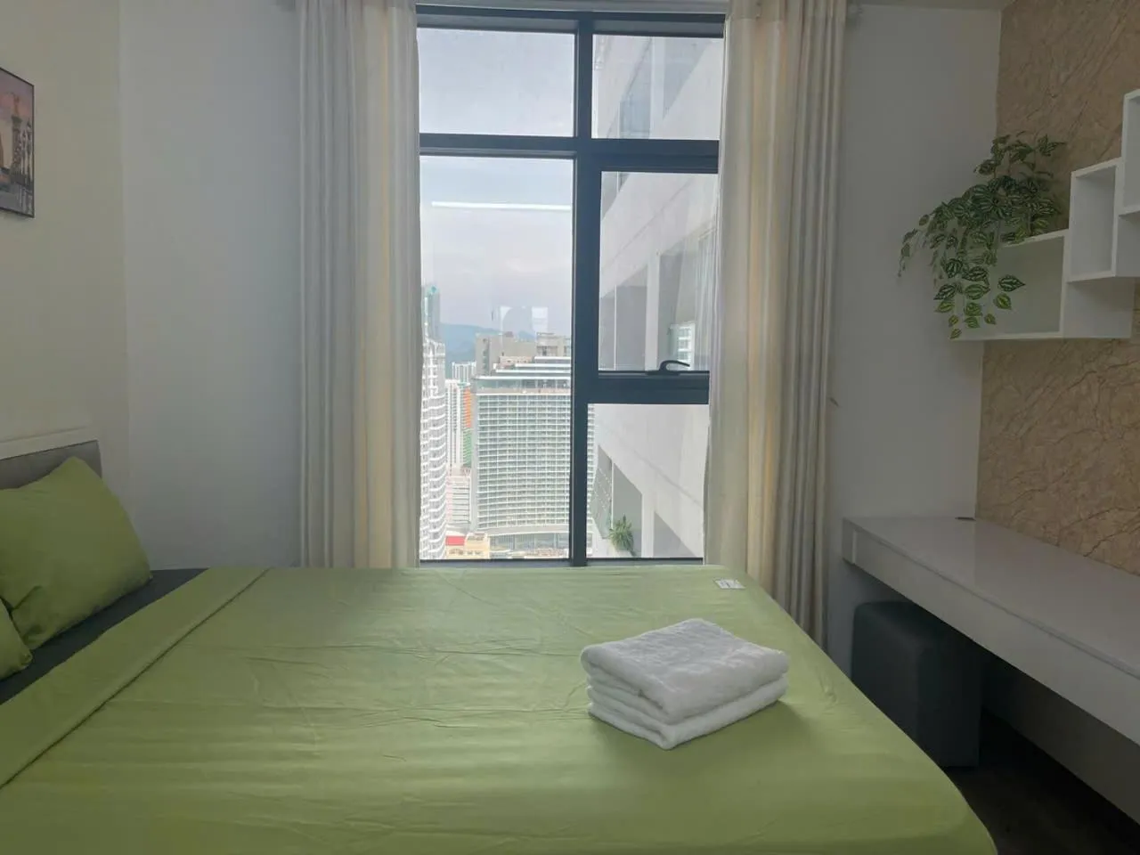 Bed in Pearl Nha Trang Beach Apartment