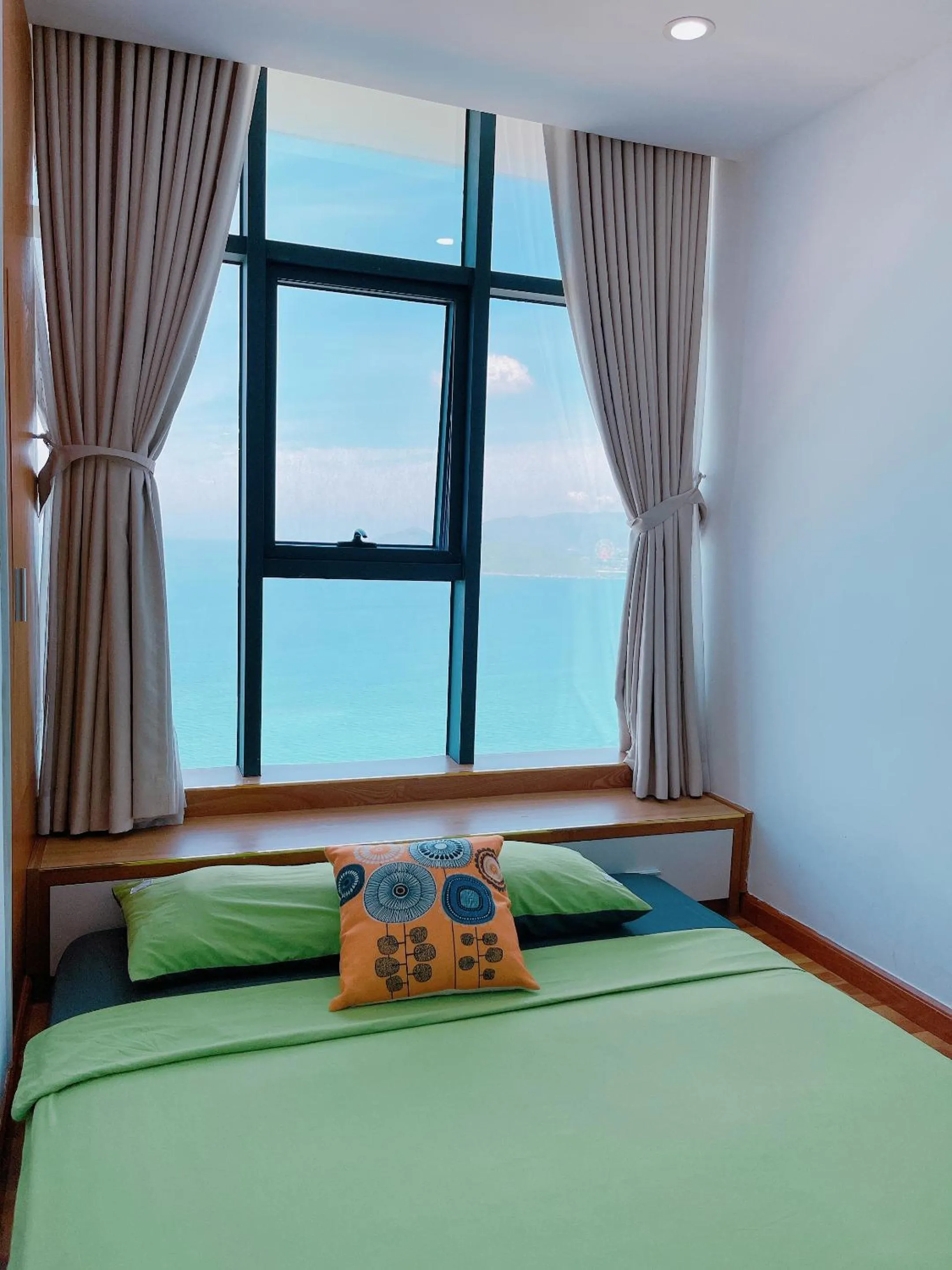 Bed in Pearl Nha Trang Beach Apartment