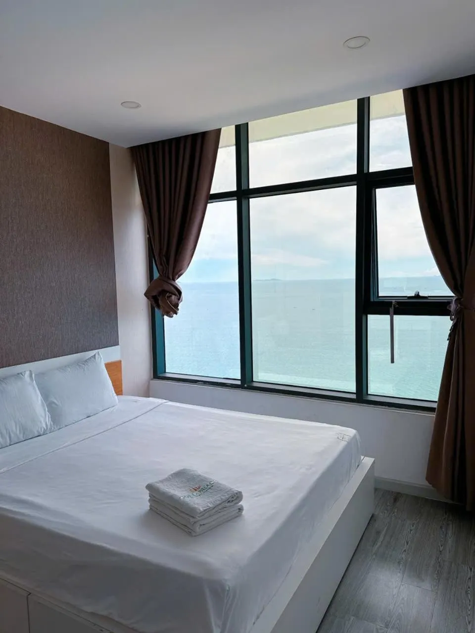 Bed in Pearl Nha Trang Beach Apartment