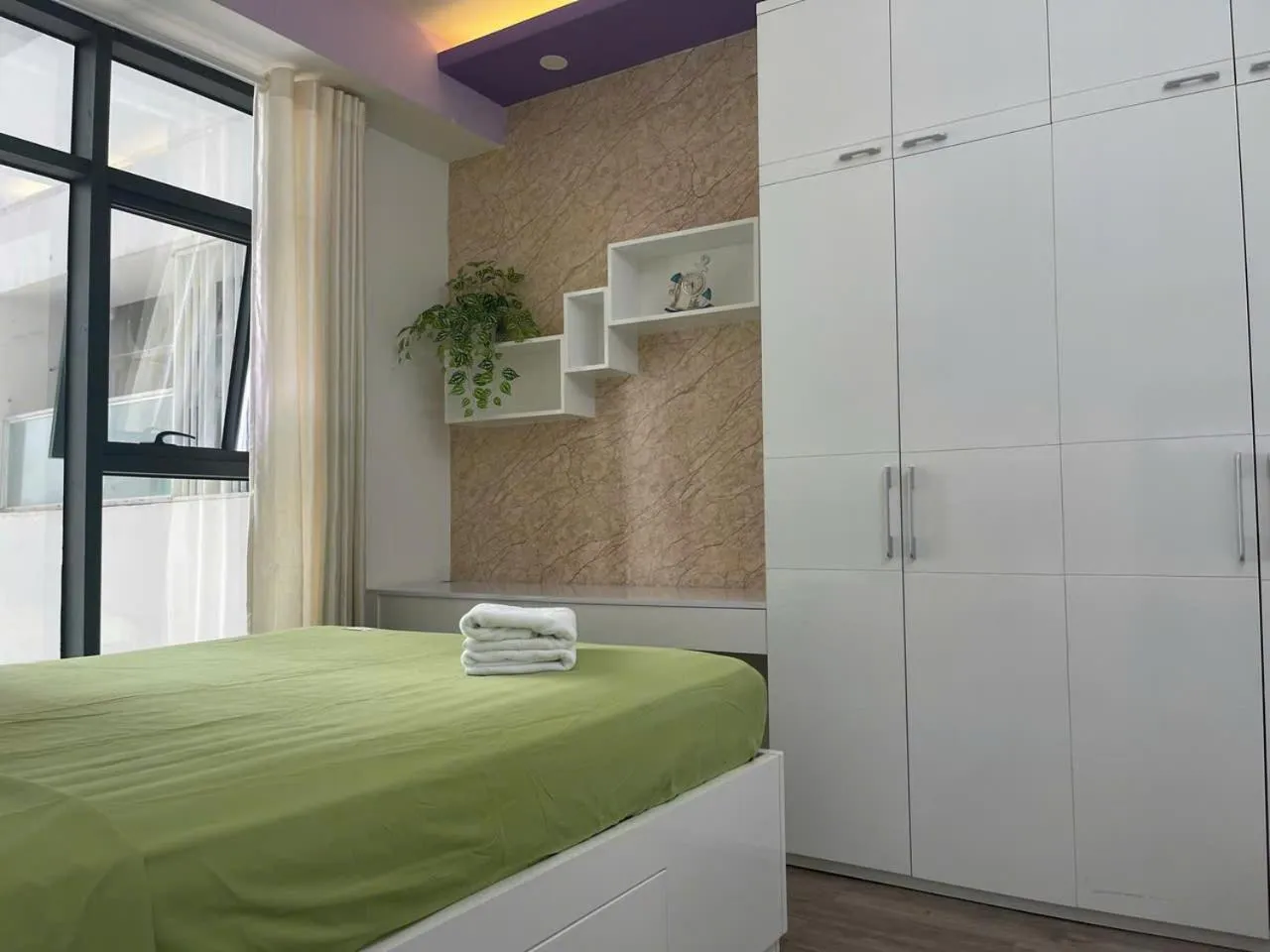 Bed in Pearl Nha Trang Beach Apartment
