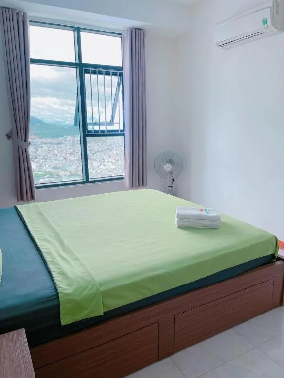 Bed in Pearl Nha Trang Beach Apartment