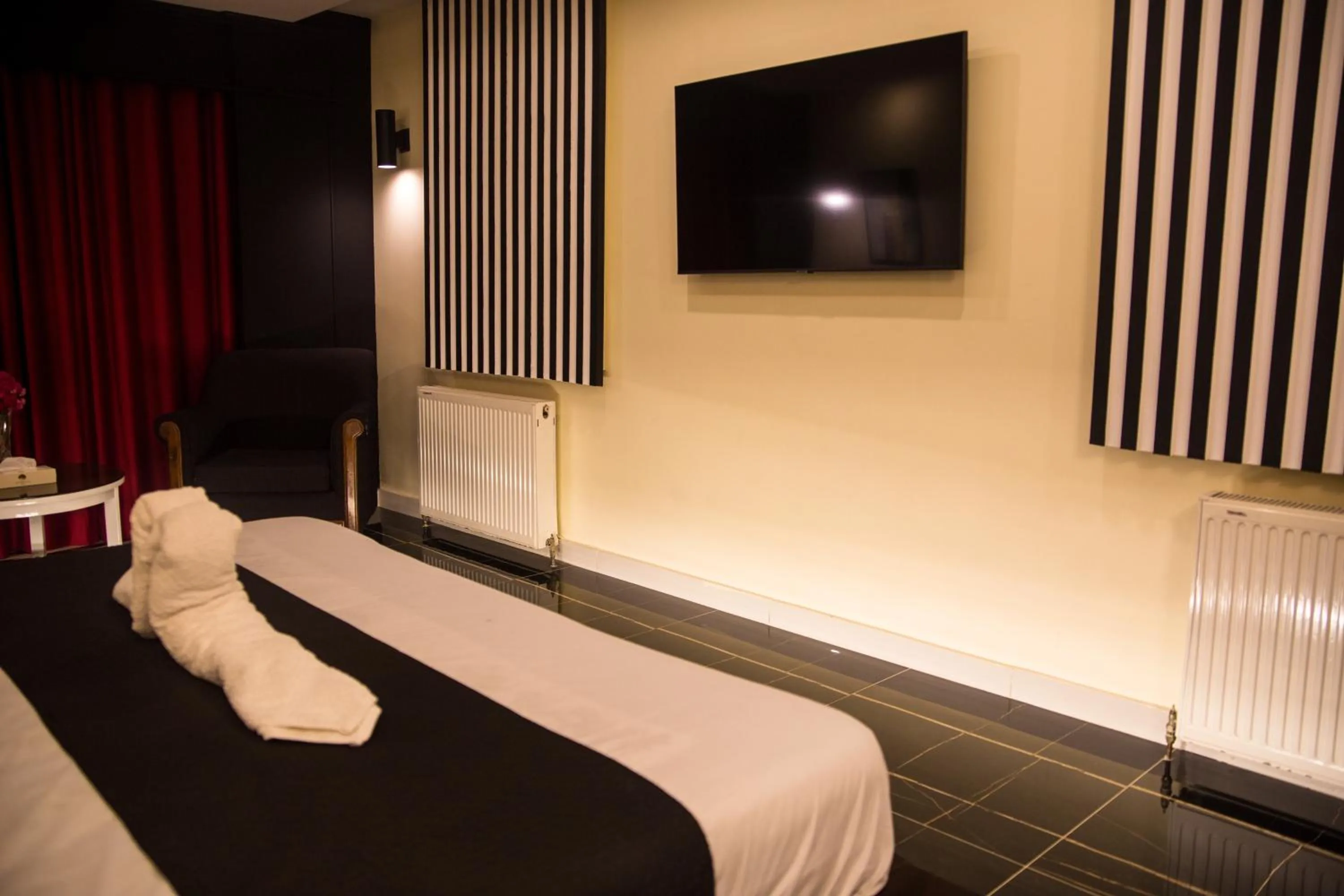 Bed in Metropole Hotel