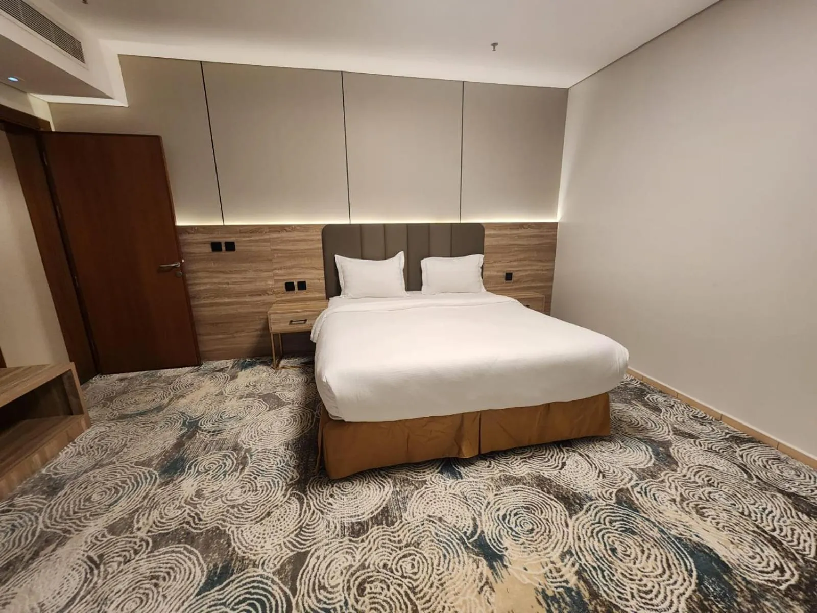 Bed in Sadeem Al Fajr Hotel Suites