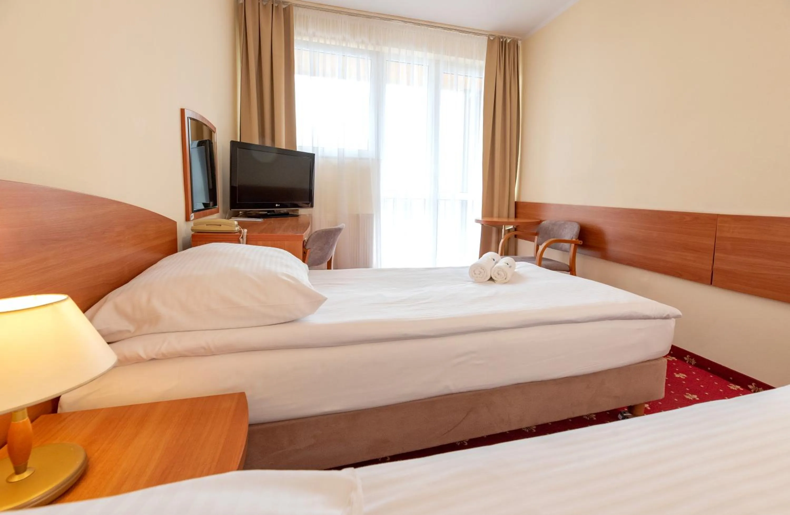 Communal lounge/ TV room, Bed in Interferie Chalkozyn w Kołobrzegu