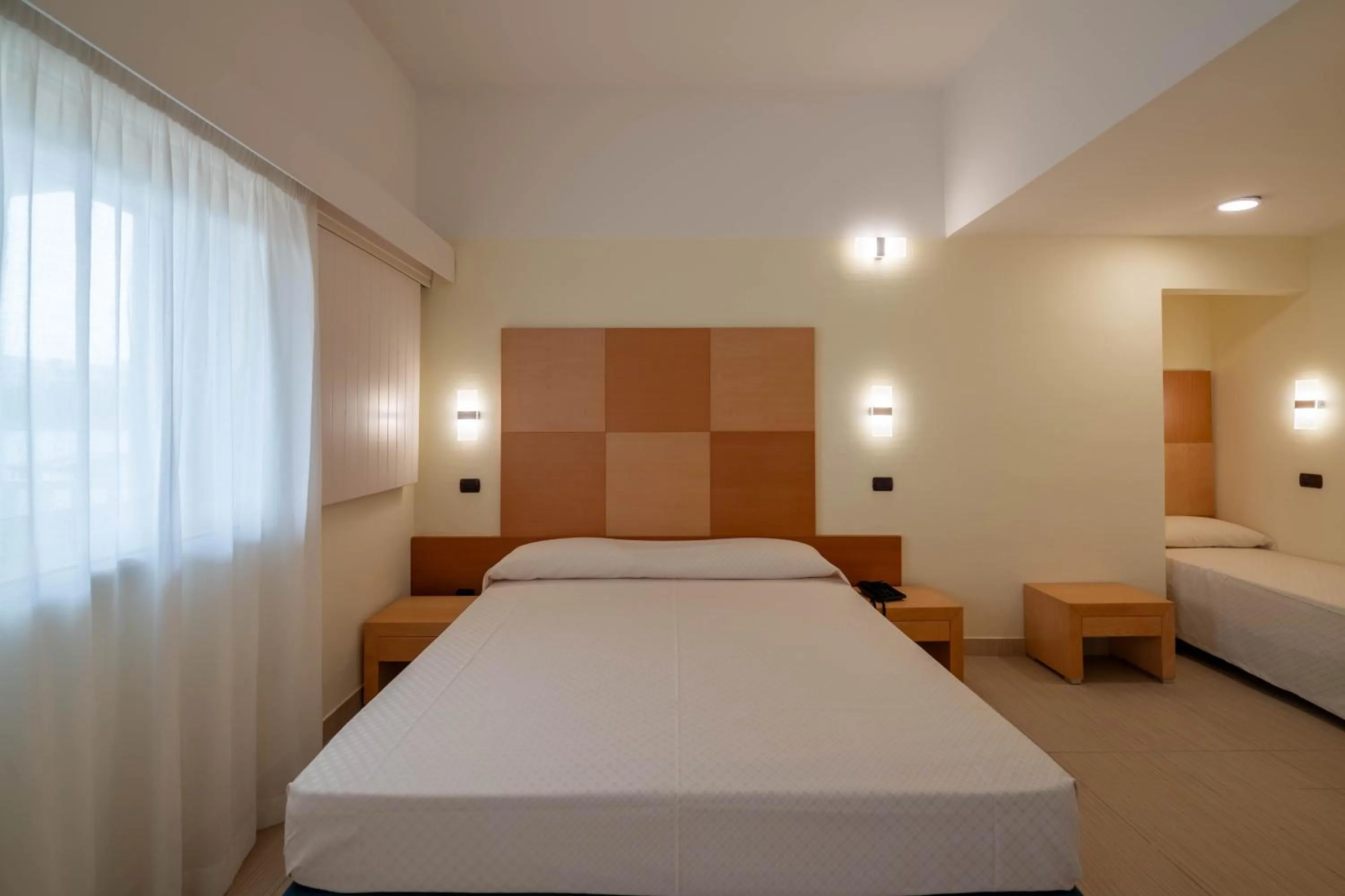Bedroom in Hotel Club Village Maritalia