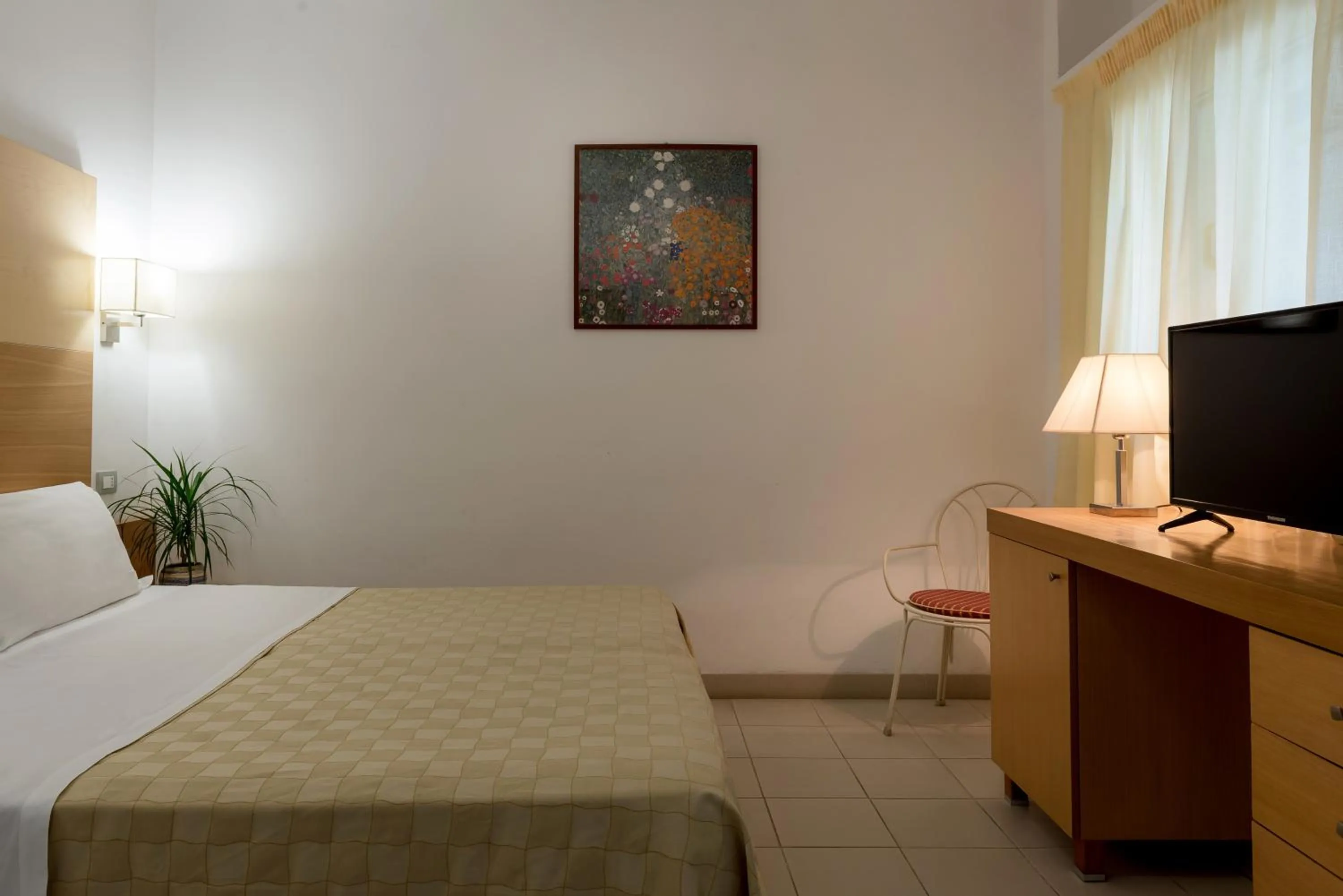 Bedroom in Hotel Club Village Maritalia