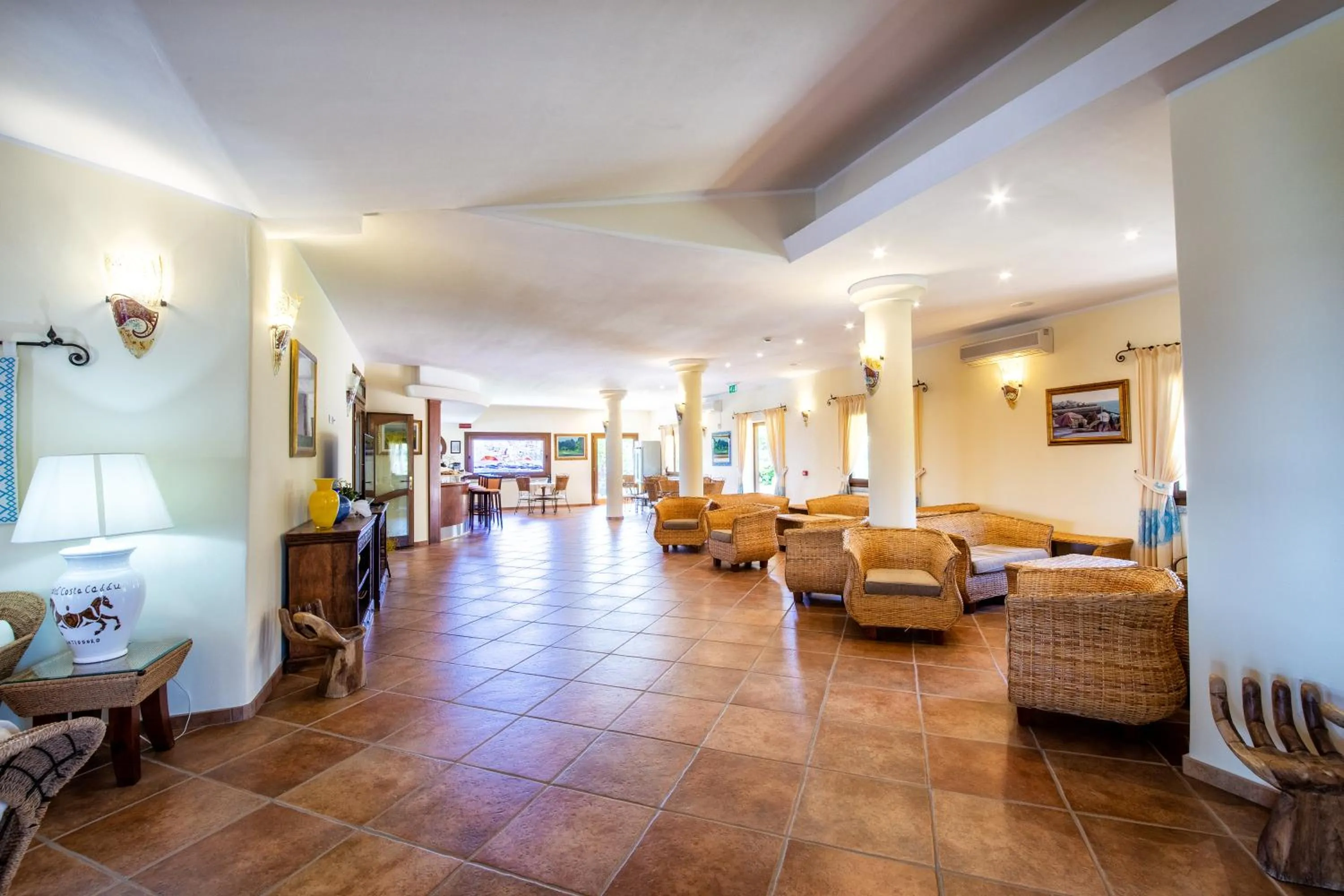 Communal lounge/ TV room in Hotel Costa Caddu