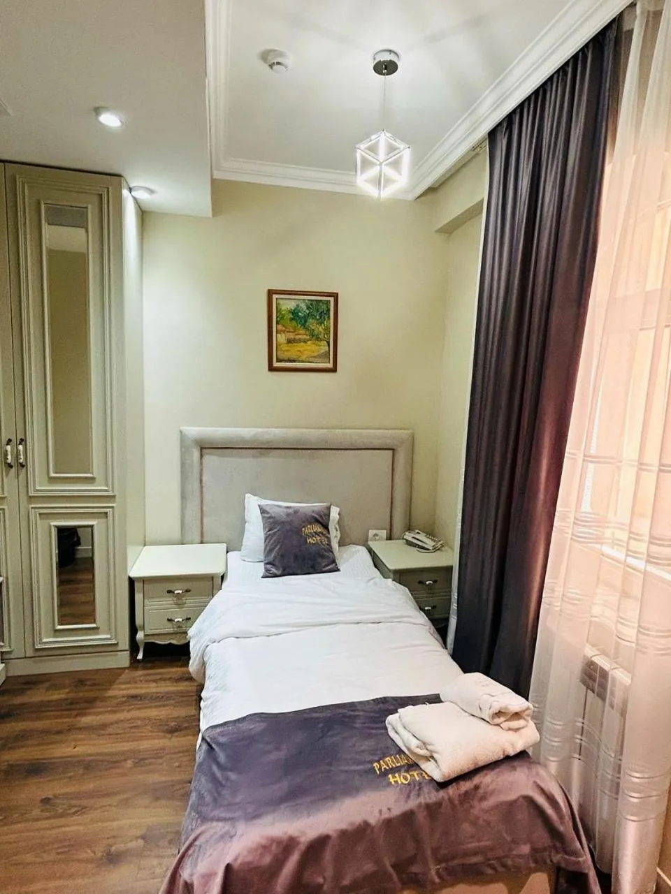 Bed in Parliament Hotel Baku